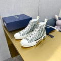 DIOR B23 HIGH-TOP SNEAKER IN WHITE AND BLACK DIOR OBLIQUE CANVAS