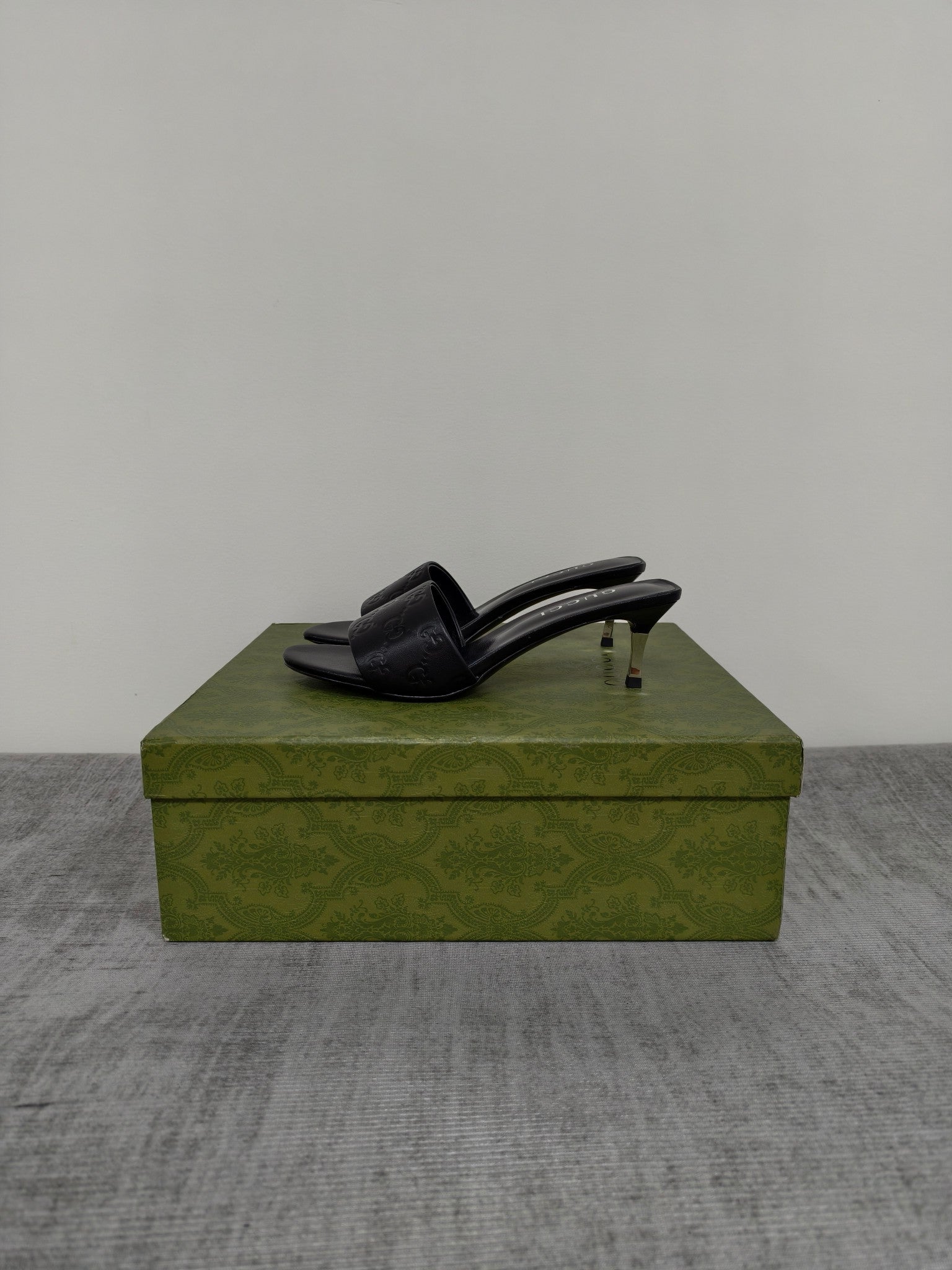 GUCCI 26S MULE SANDALS 55MM IN BLACK CALFSKIN GG EMBOSSED