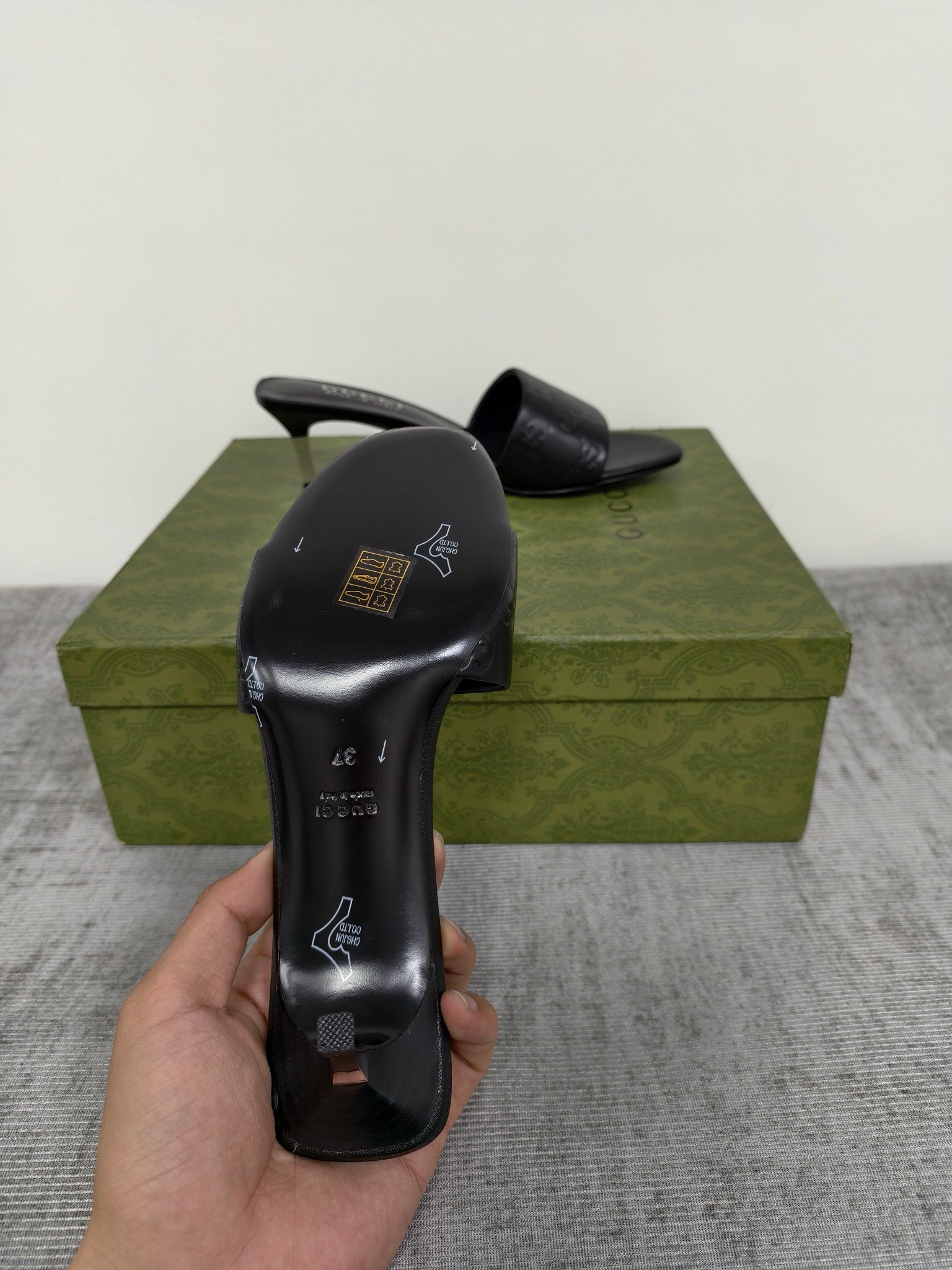 GUCCI 26S MULE SANDALS 55MM IN BLACK CALFSKIN GG EMBOSSED