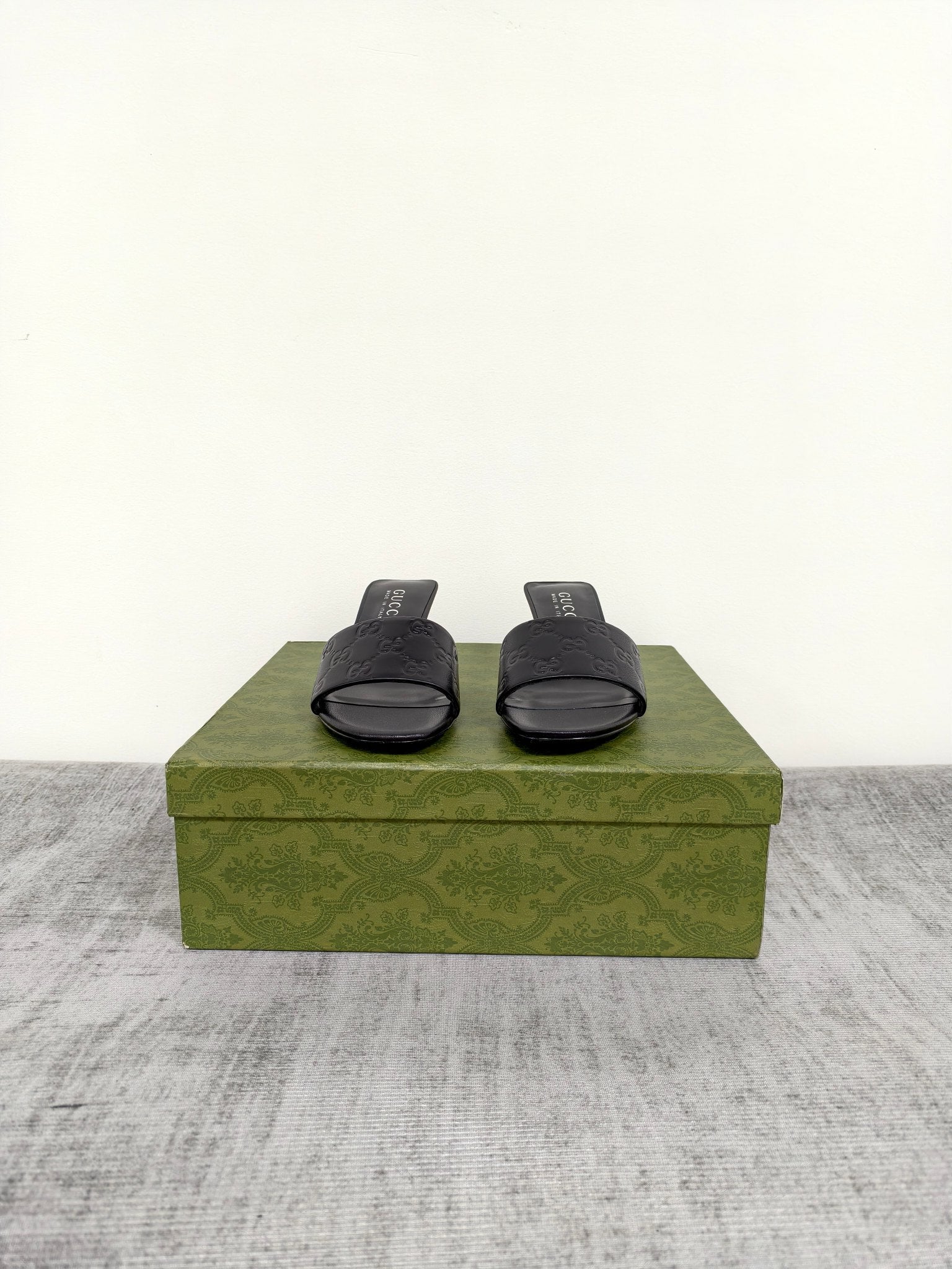 GUCCI 26S MULE SANDALS 55MM IN BLACK CALFSKIN GG EMBOSSED