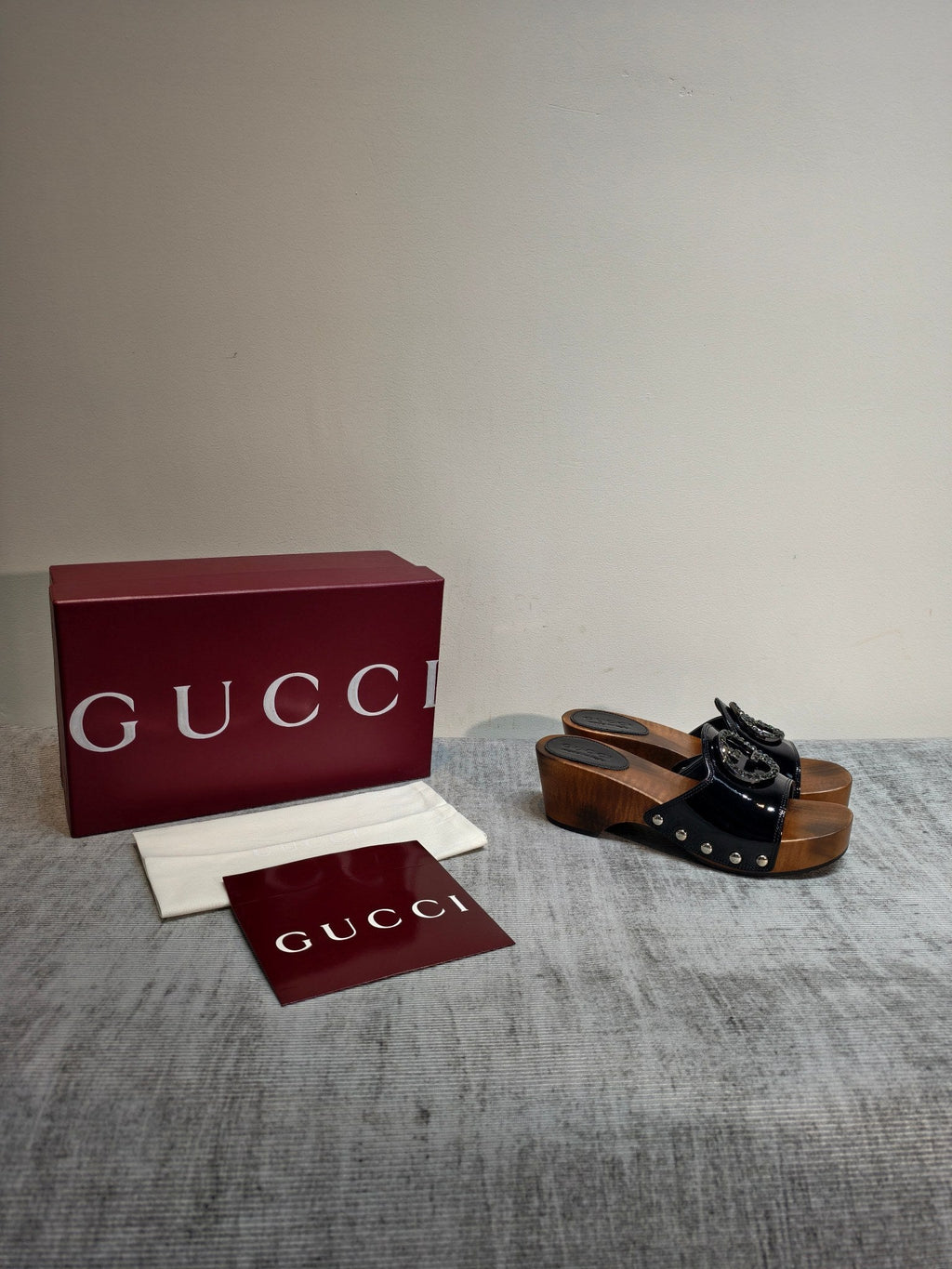 GUCCI 26S PLATFORM MULES IN BLACK PATENT CALFSKIN