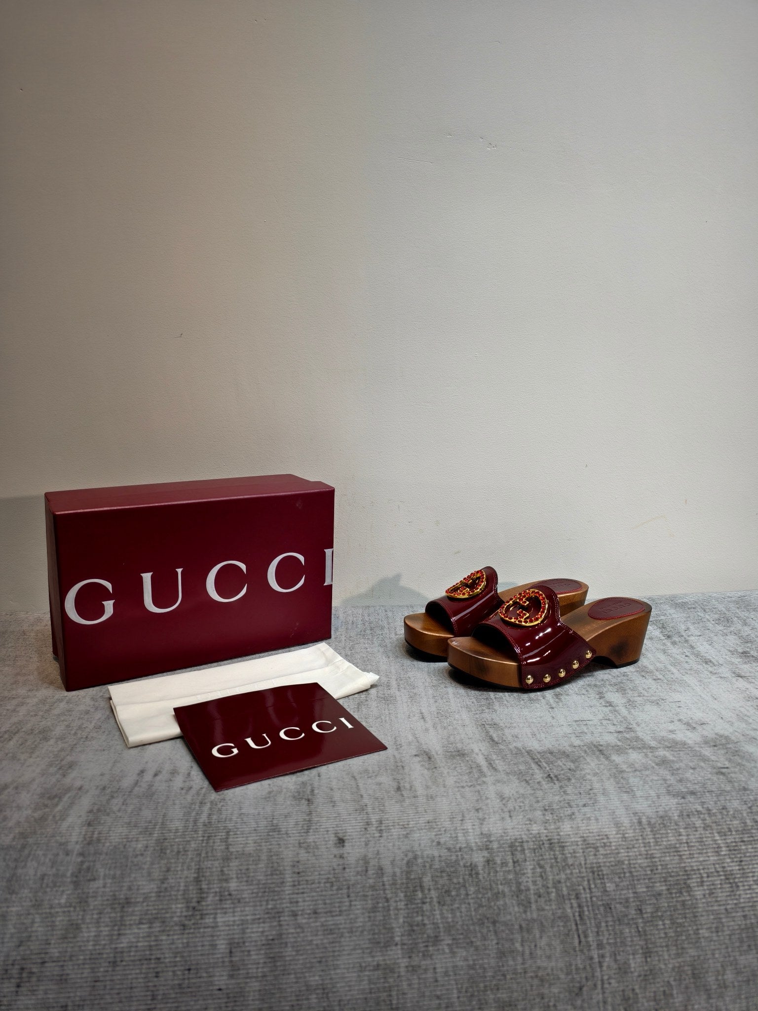 GUCCI 26S PLATFORM MULES IN BURGUNDY RED PATENT CALFSKIN GOLD HARDWARE