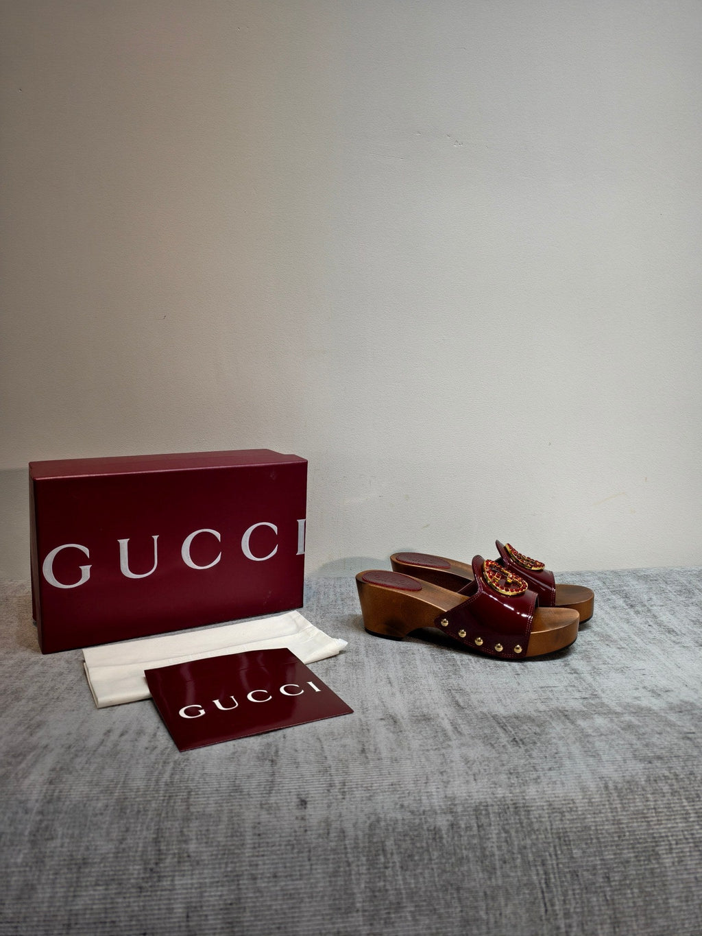 GUCCI 26S PLATFORM MULES IN BURGUNDY RED PATENT CALFSKIN GOLD HARDWARE