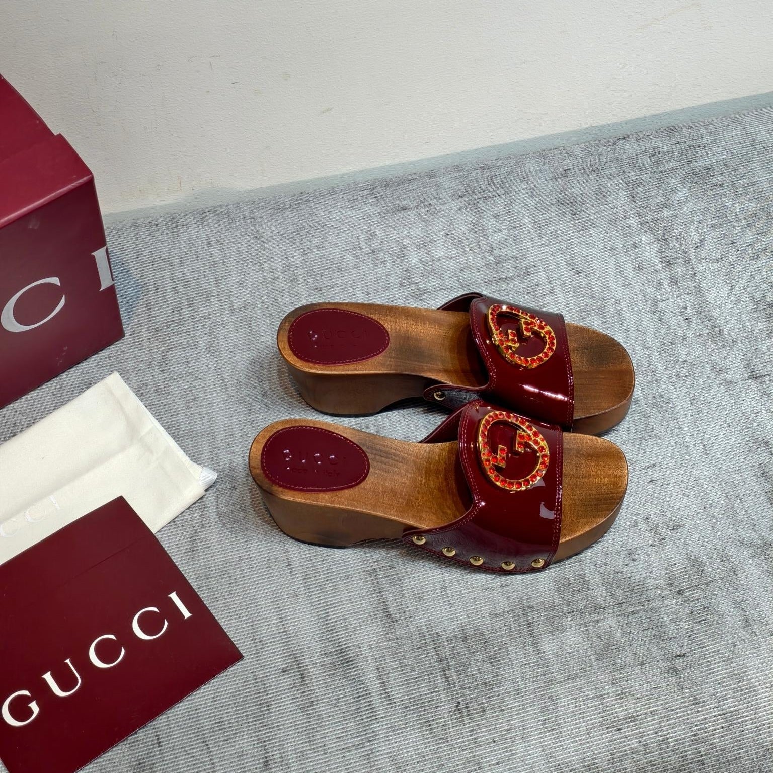 GUCCI 26S PLATFORM MULES IN BURGUNDY RED PATENT CALFSKIN GOLD HARDWARE