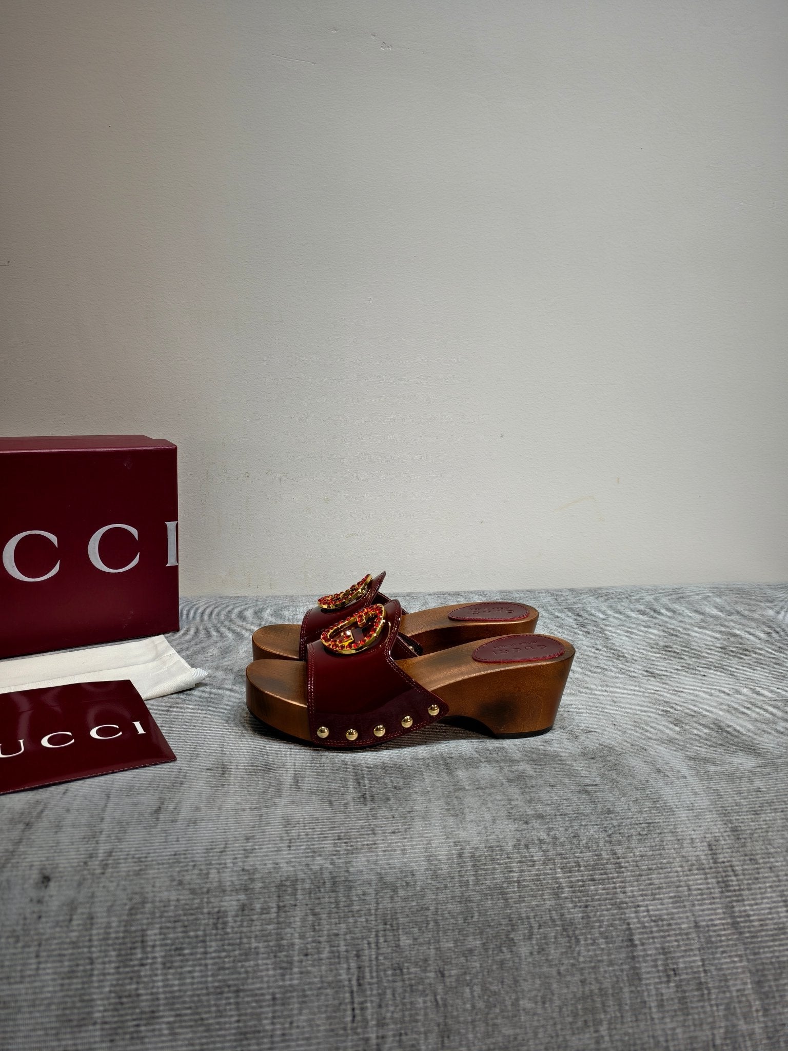 GUCCI 26S PLATFORM MULES IN BURGUNDY RED PATENT CALFSKIN GOLD HARDWARE