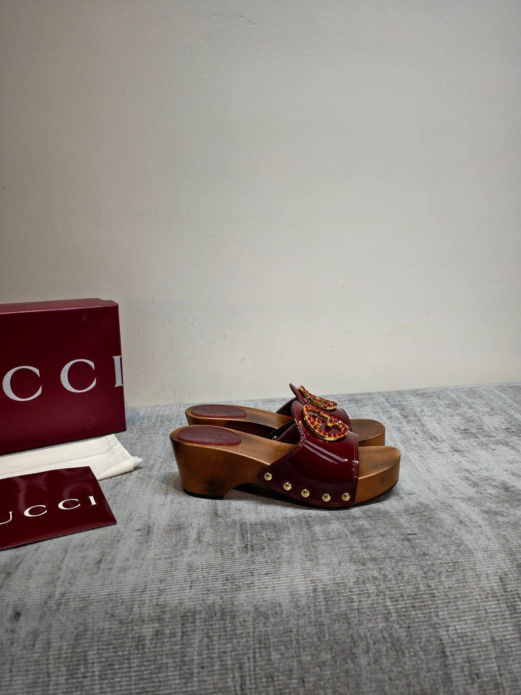 GUCCI 26S PLATFORM MULES IN BURGUNDY RED PATENT CALFSKIN GOLD HARDWARE