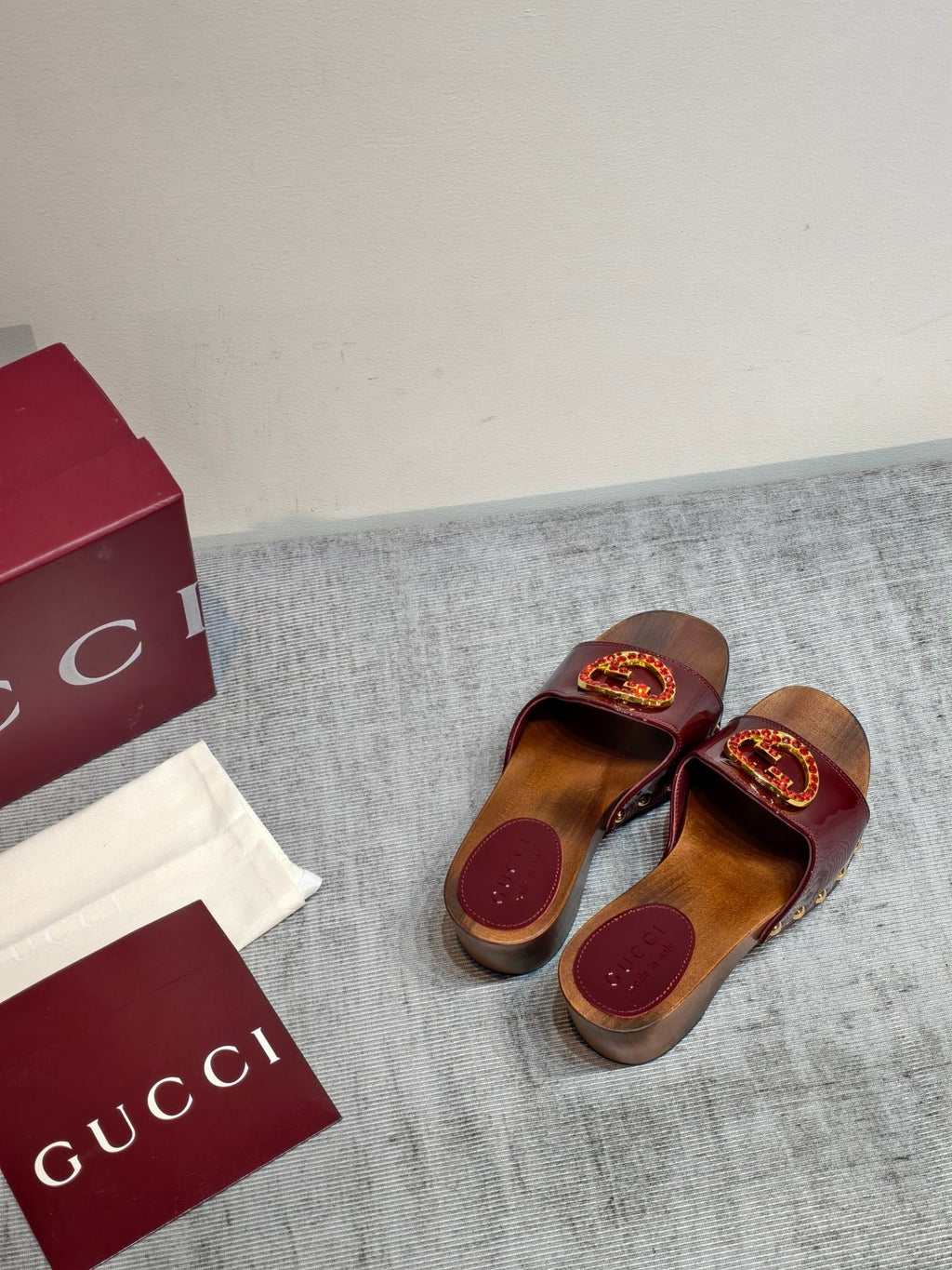 GUCCI 26S PLATFORM MULES IN BURGUNDY RED PATENT CALFSKIN GOLD HARDWARE