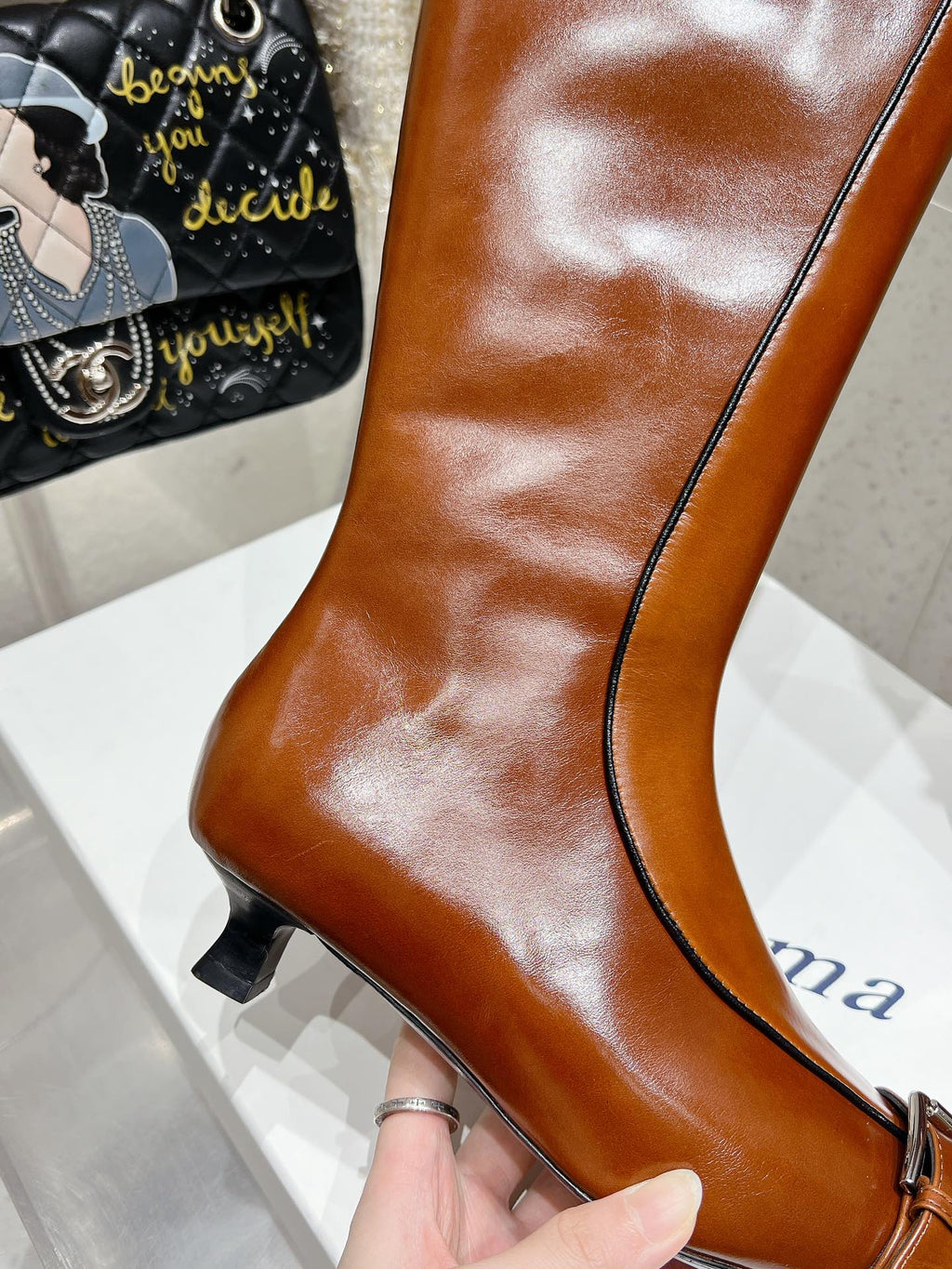 ALO 25S PALOMA WOOL HIGH BOOTS IN BROWN LAMBSKIN WITH METAL BUCKLE DETAIL AT THE TOE
