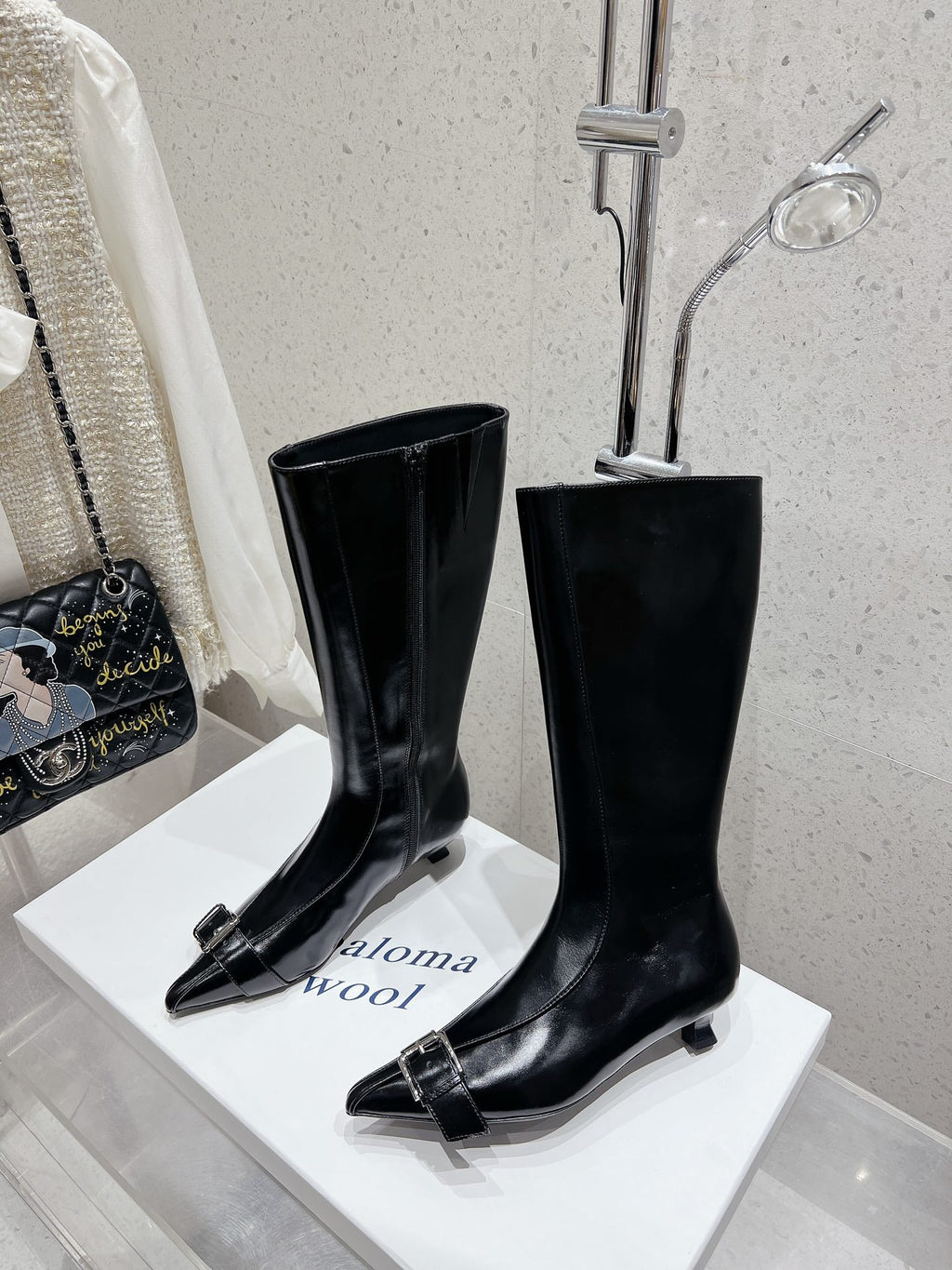 ALO 25S PALOMA WOOL HIGH BOOTS IN BLACK LAMBSKIN WITH METAL BUCKLE DETAIL AT THE TOE