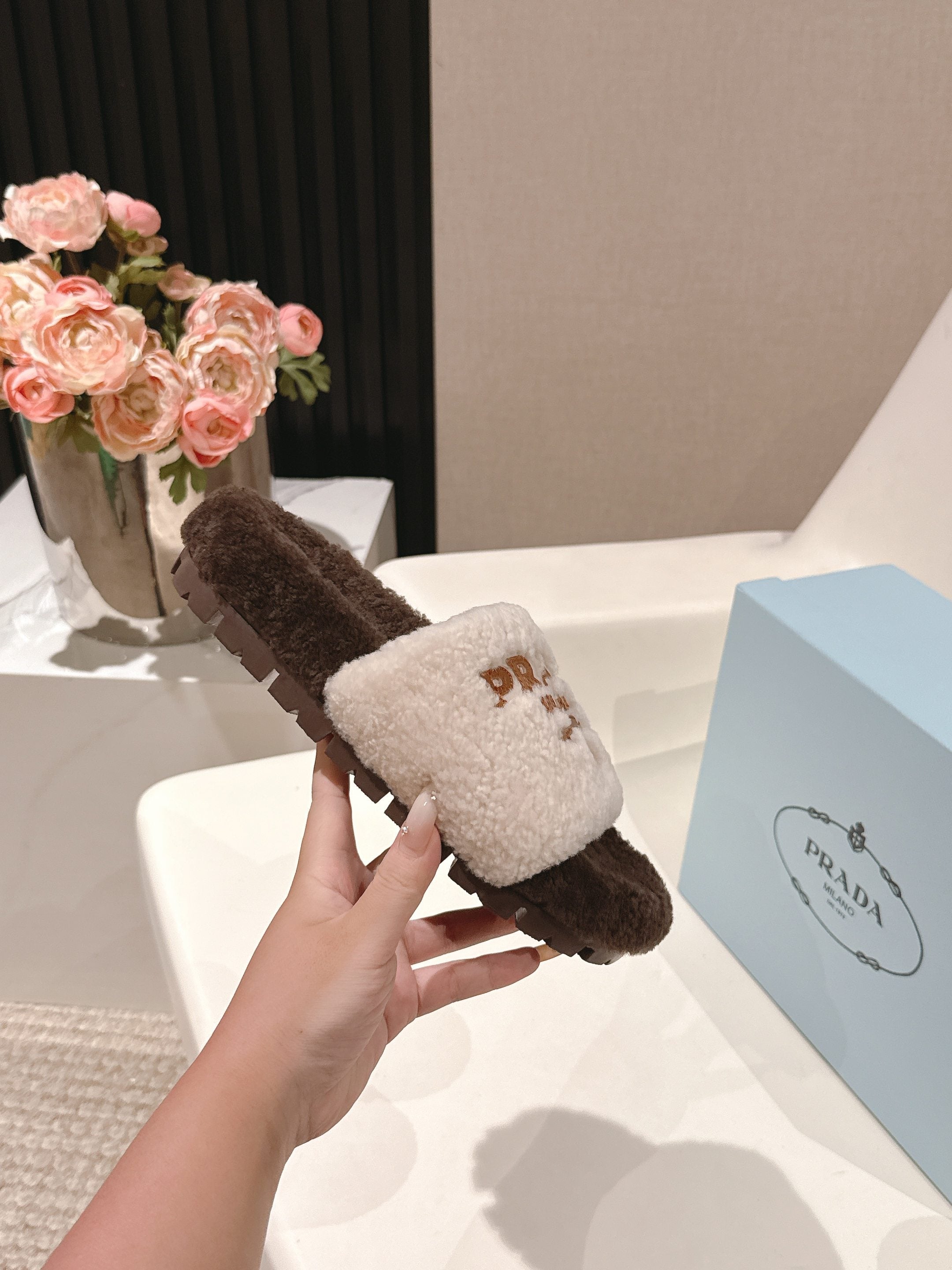 PRADA 25S FLAT MULES IN WHITE AND DARK BROWN RABBIT FUR
