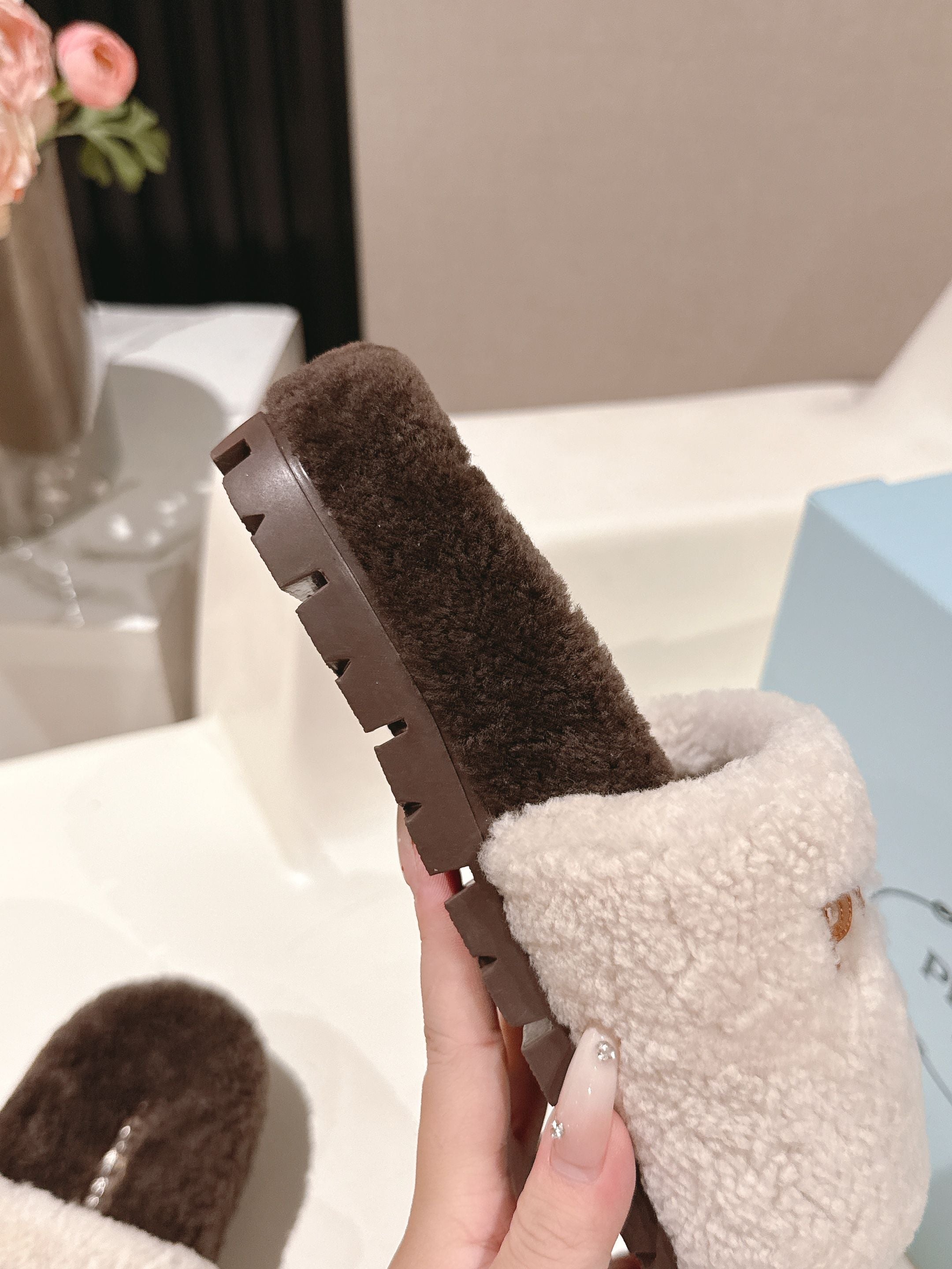 PRADA 25S FLAT MULES IN WHITE AND DARK BROWN RABBIT FUR