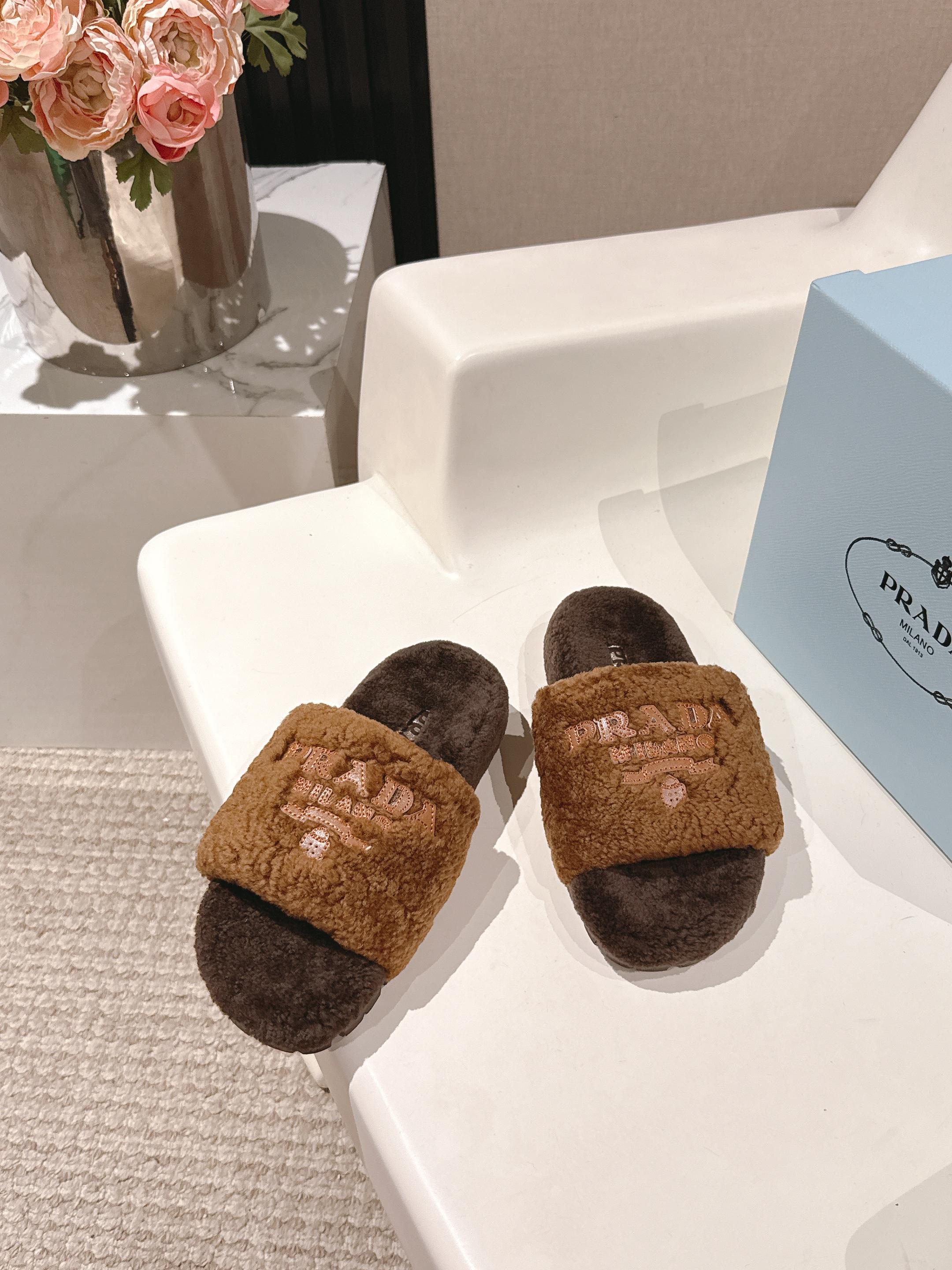 PRADA 25S FLAT MULES IN DARK BROWN RABBIT FUR