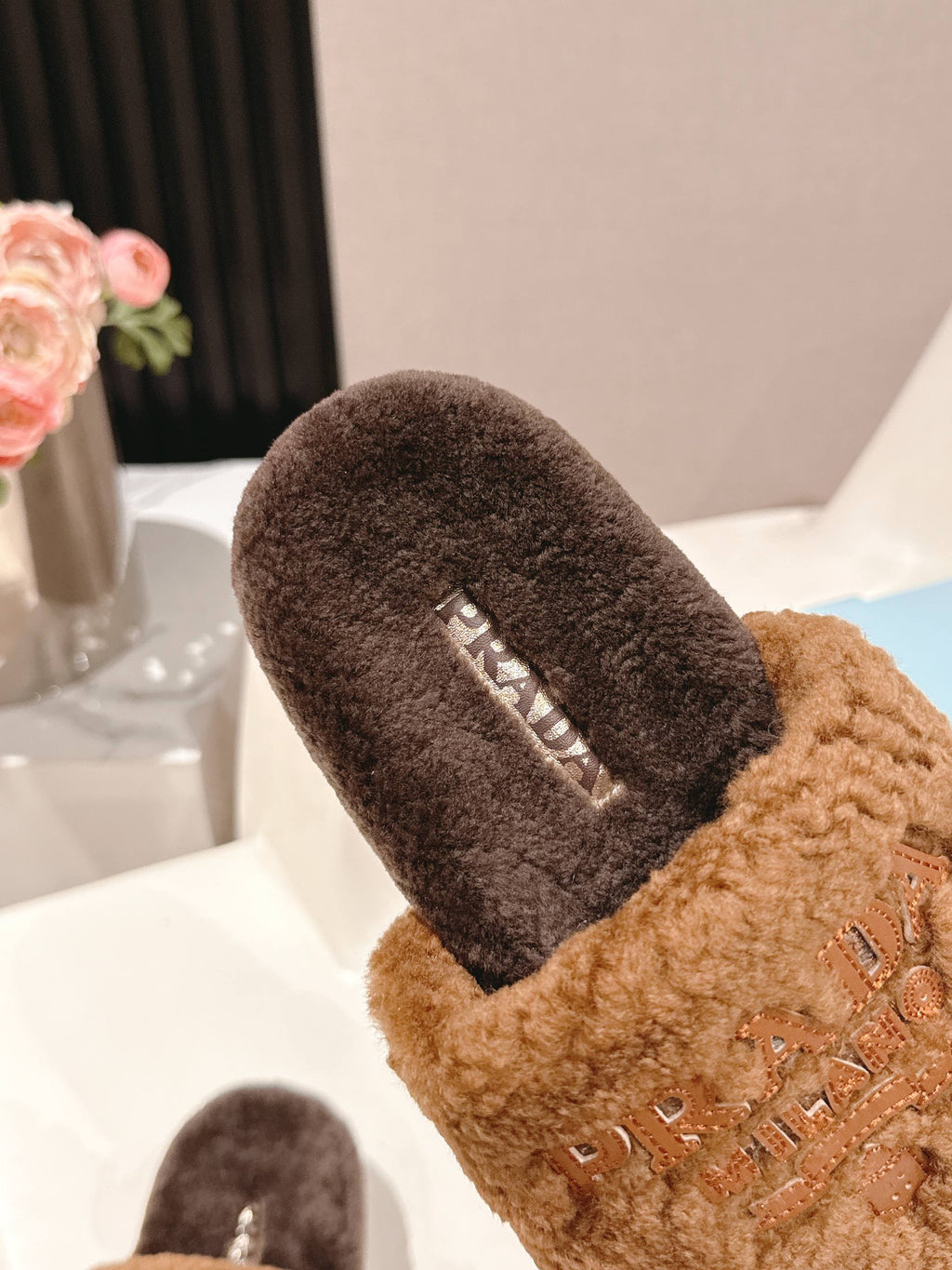 PRADA 25S FLAT MULES IN DARK BROWN RABBIT FUR