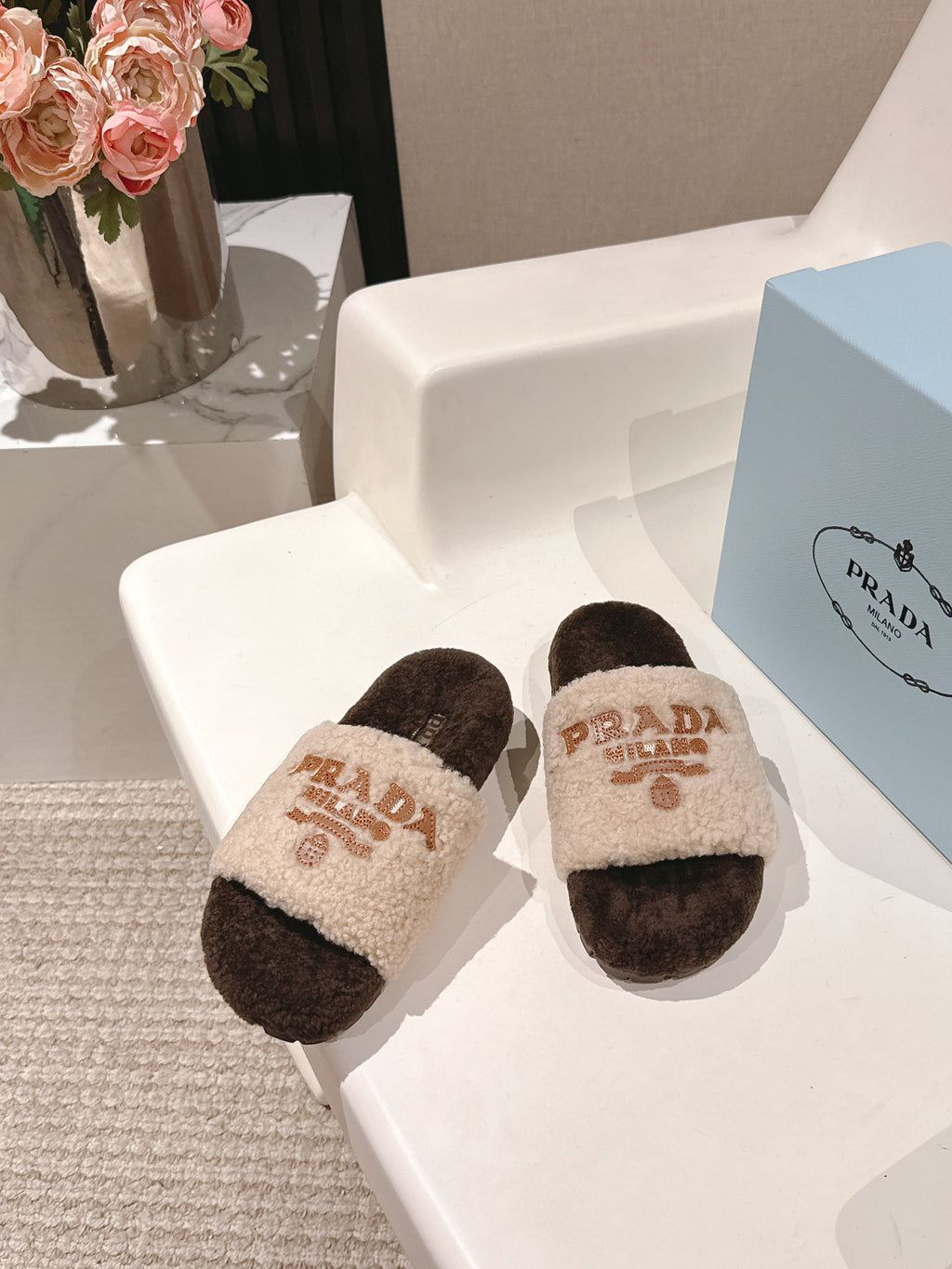 PRADA 25S FLAT MULES IN CREAM AND DARK BROWN RABBIT FUR