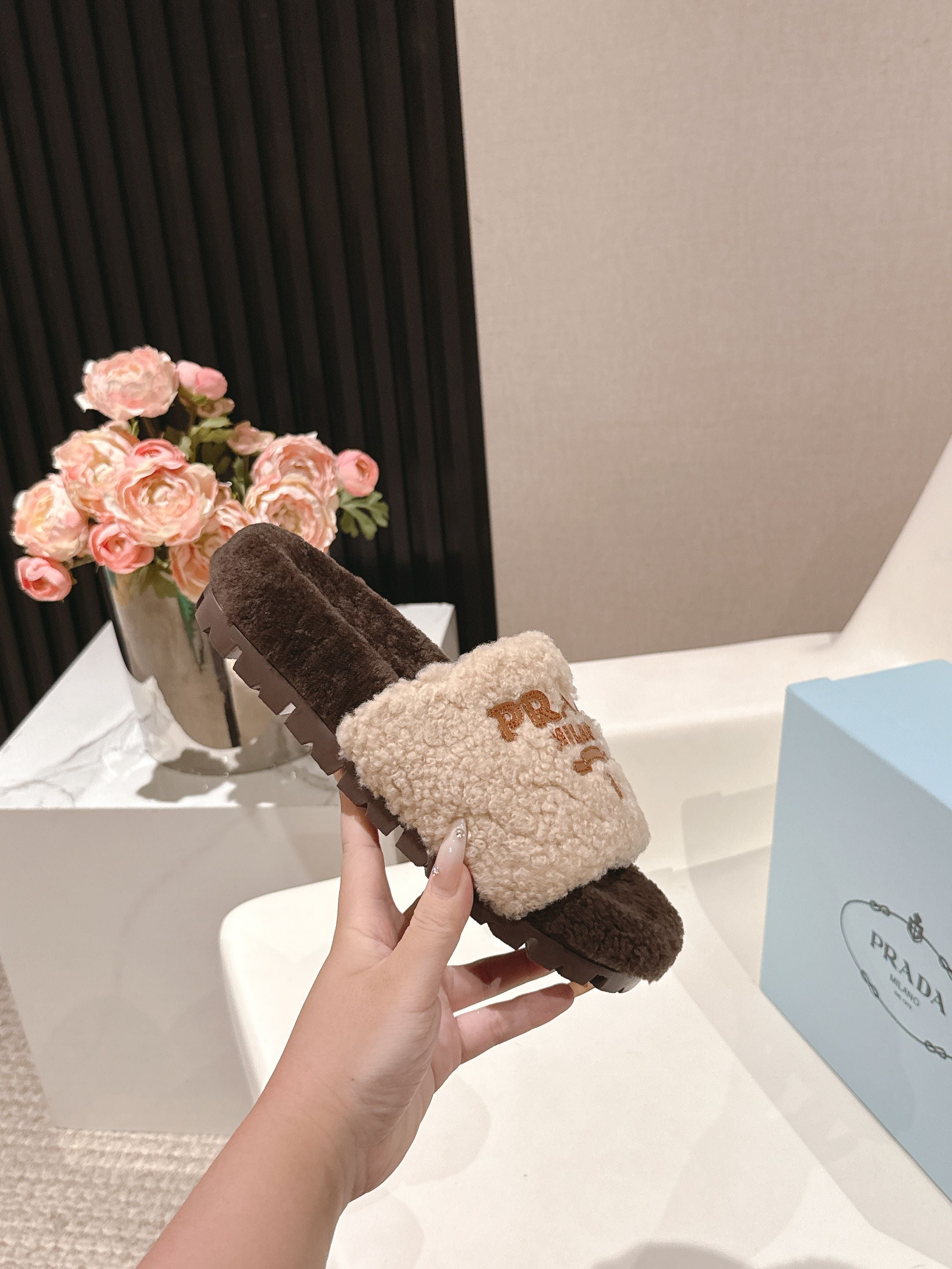 PRADA 25S FLAT MULES IN CREAM AND DARK BROWN RABBIT FUR