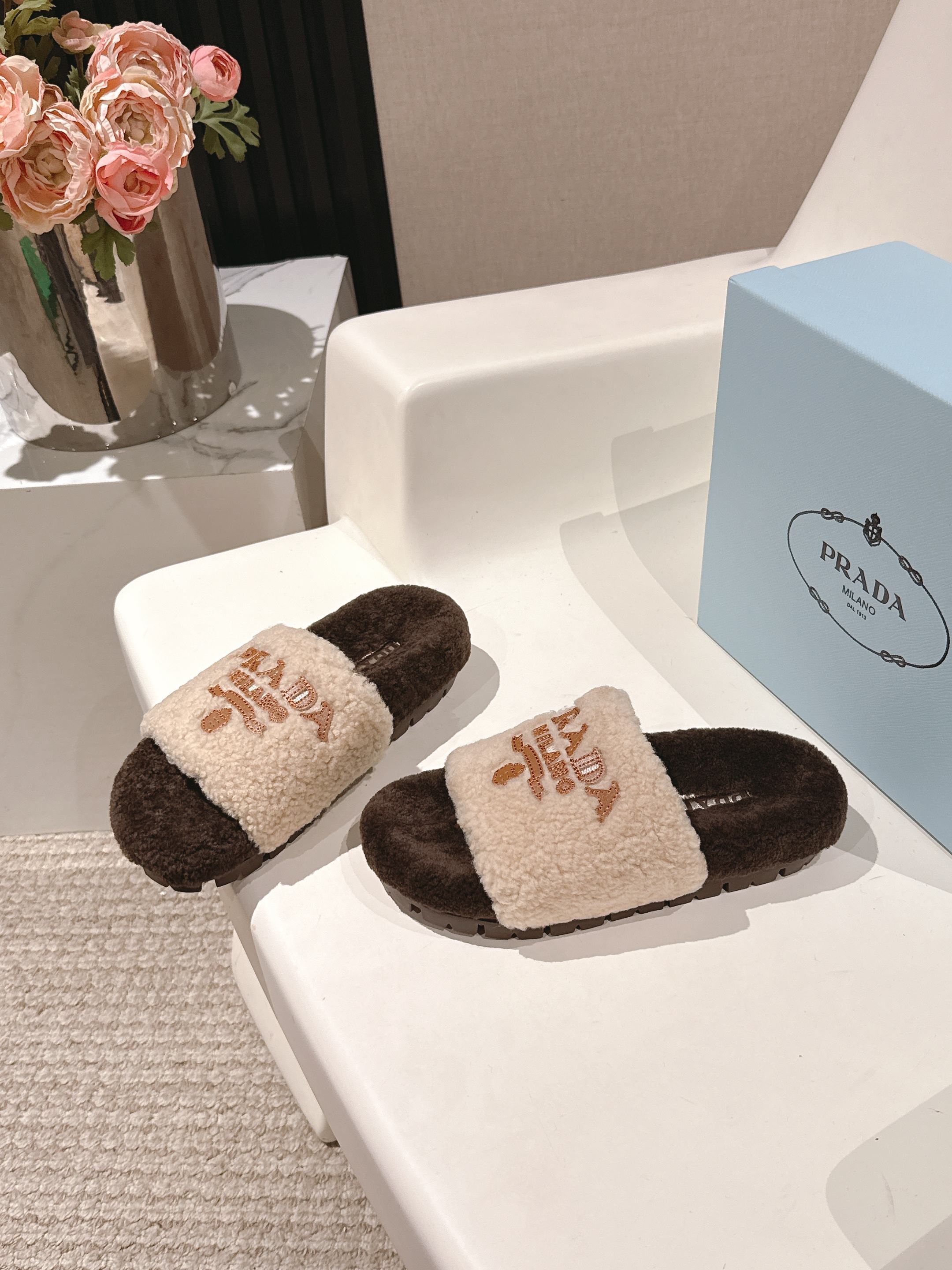 PRADA 25S FLAT MULES IN CREAM AND DARK BROWN RABBIT FUR