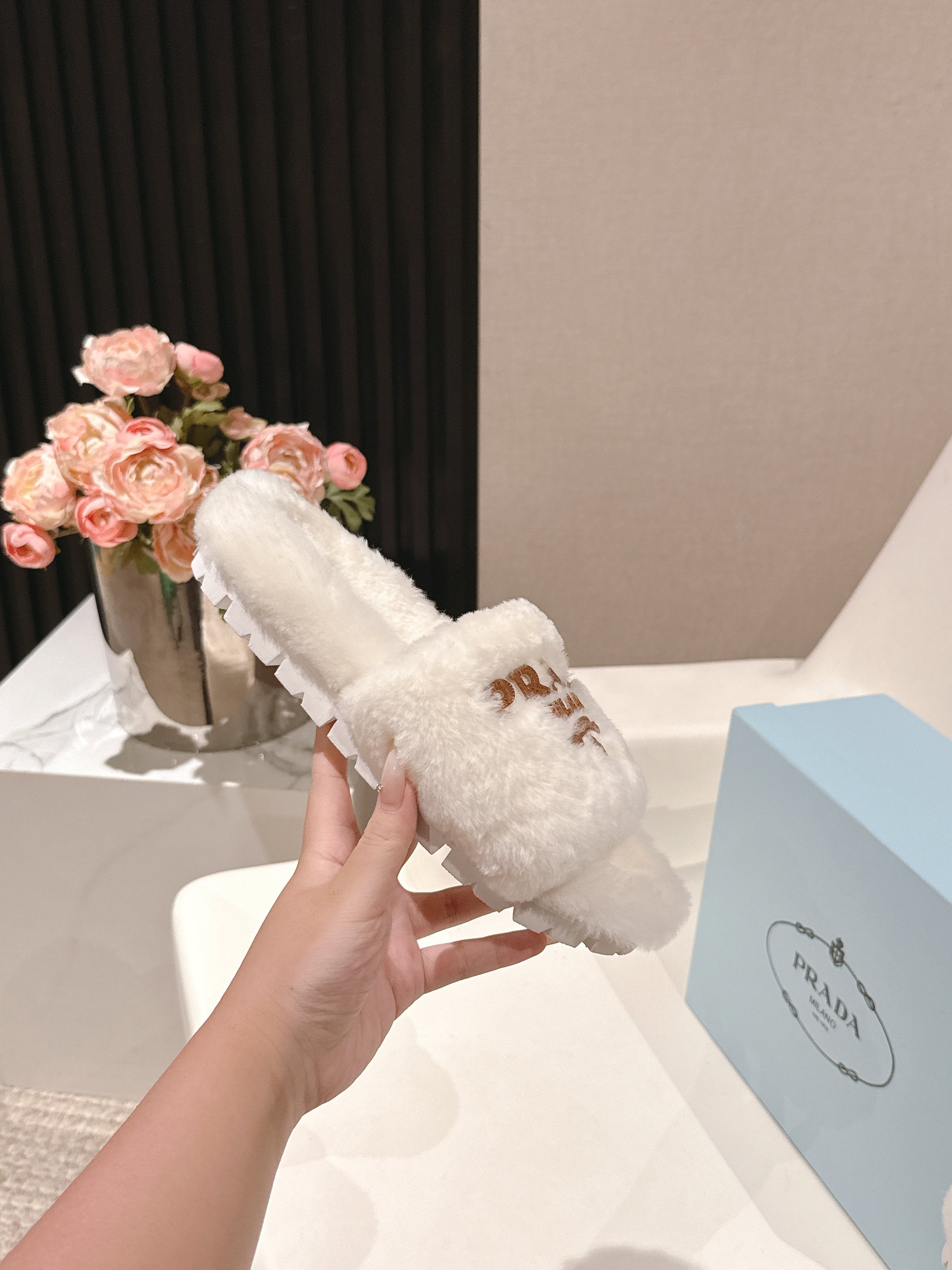 PRADA 25S FLAT MULES IN WHITE RABBIT FUR