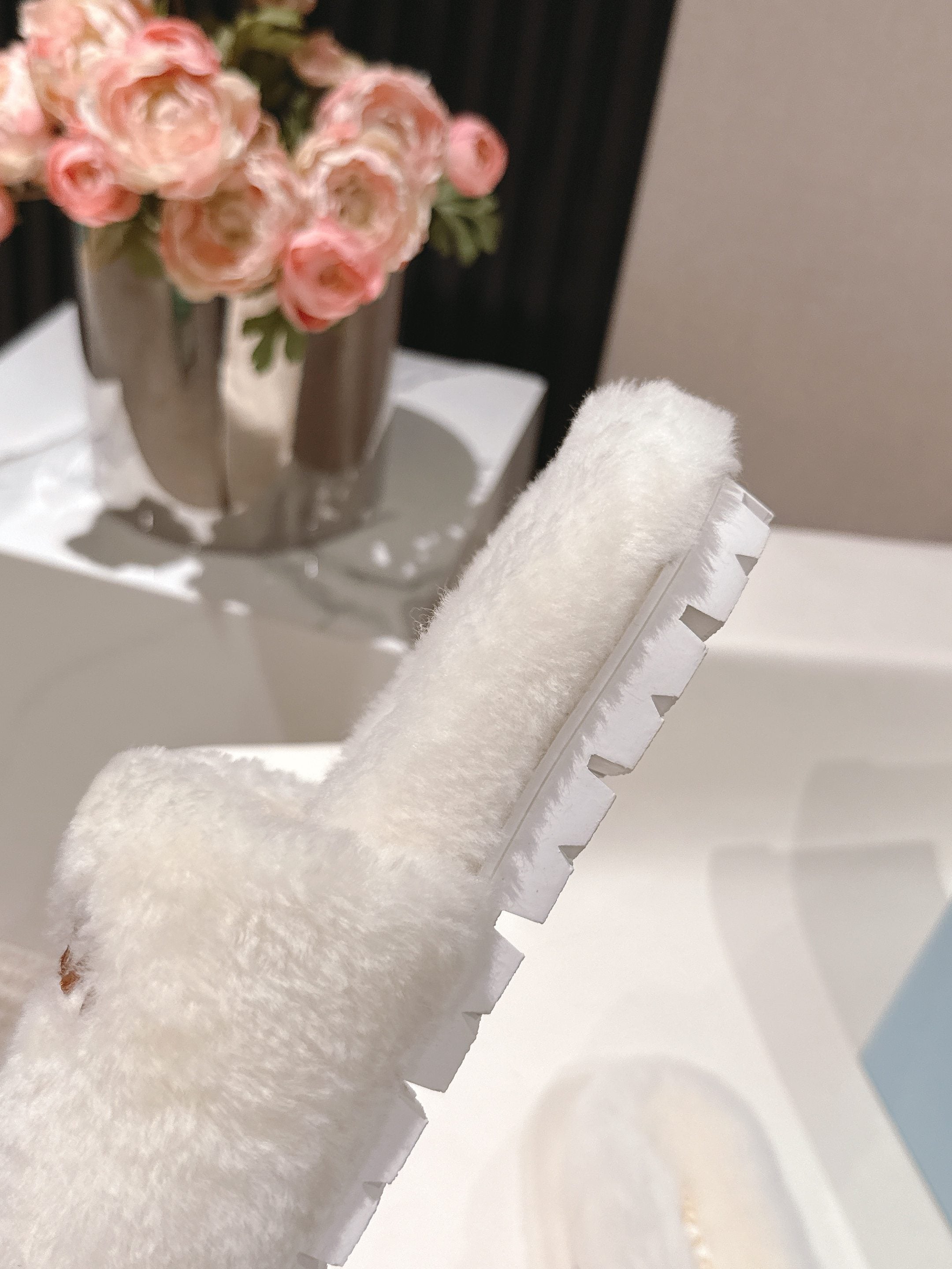 PRADA 25S FLAT MULES IN WHITE RABBIT FUR