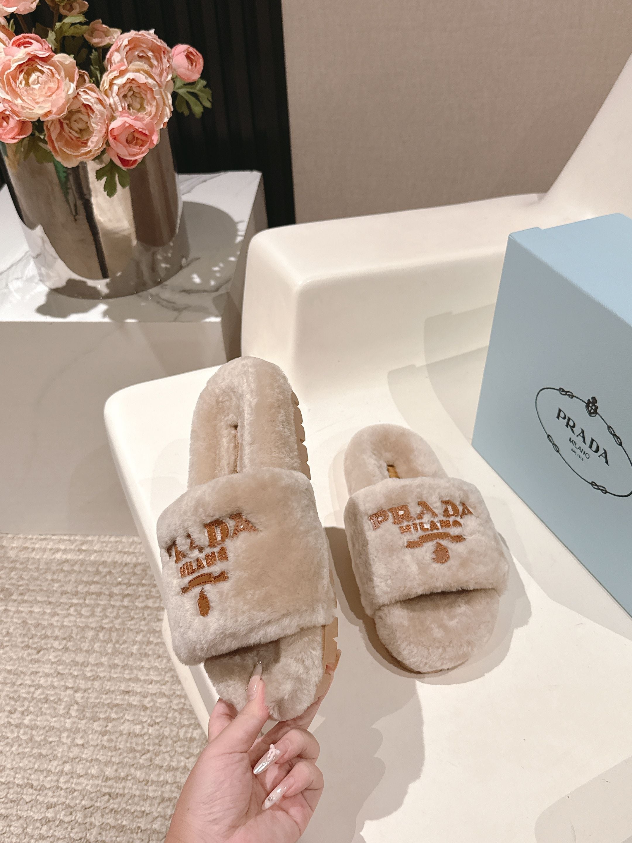 PRADA 25S FLAT MULES IN WARM TAUPE RABBIT FUR