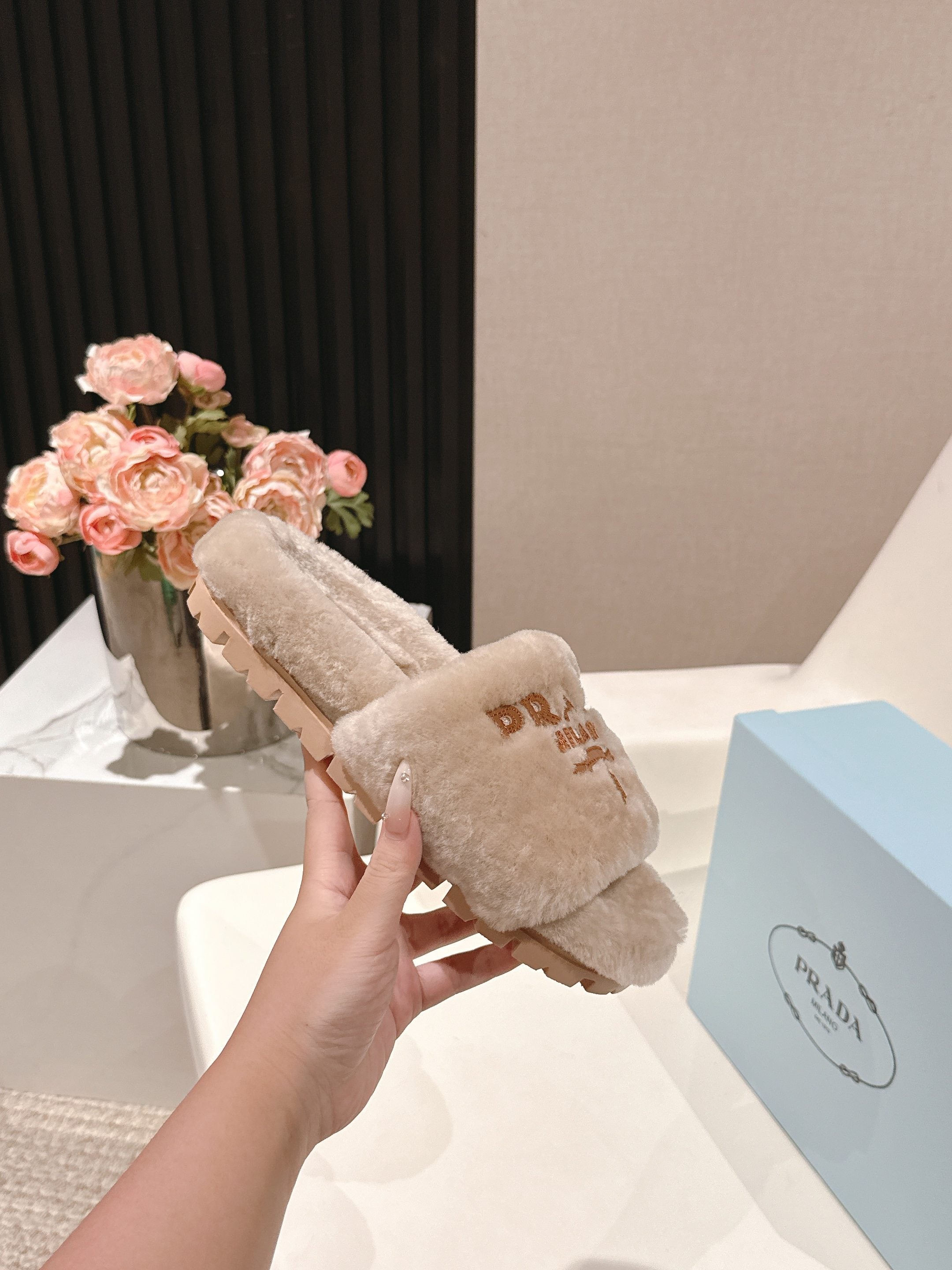 PRADA 25S FLAT MULES IN WARM TAUPE RABBIT FUR