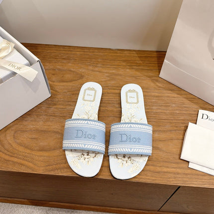 DIOR 26S FLAT SLIDE SANDALS IN LIGHT BLUE CANVAS