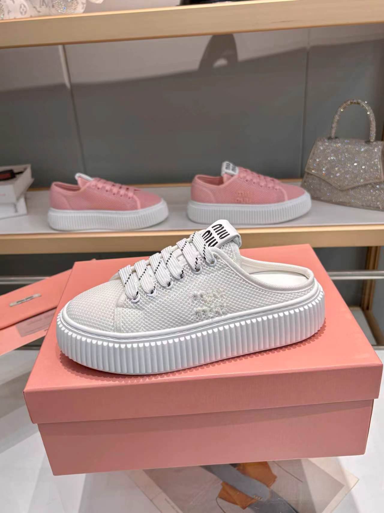 MIUMIU 26S SNEAKER MULES 45MM IN WHITE MESH
