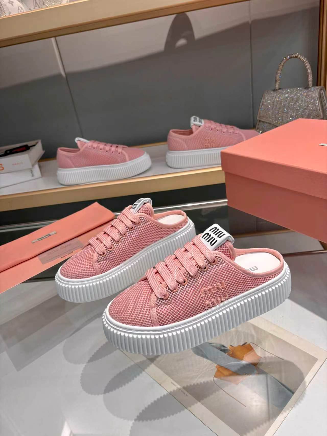 MIUMIU 26S SNEAKER MULES 45MM IN PINK MESH