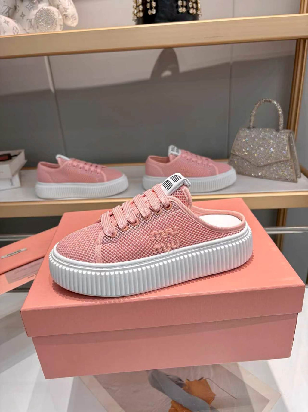 MIUMIU 26S SNEAKER MULES 45MM IN PINK MESH