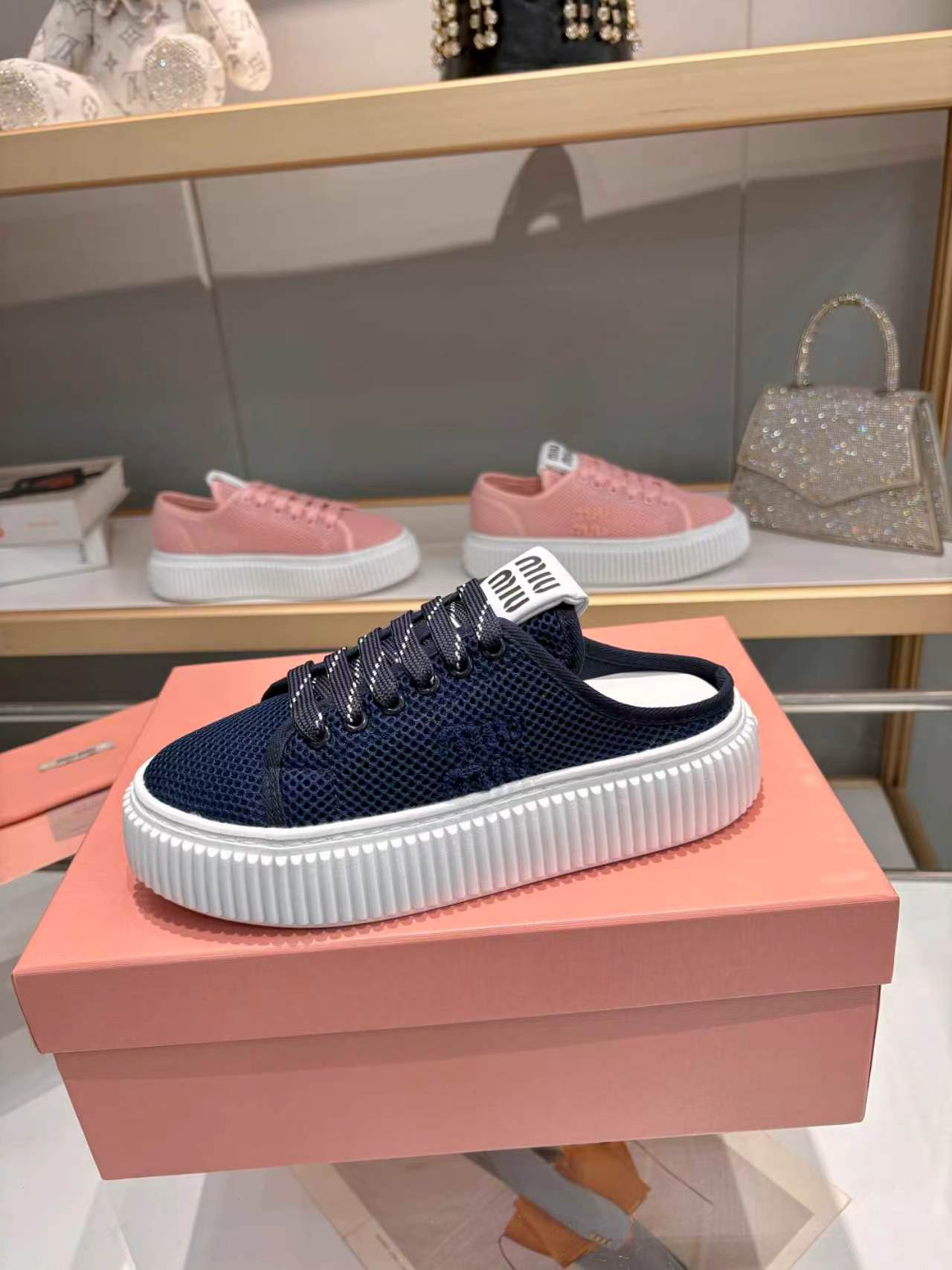 MIUMIU 26S SNEAKER MULES 45MM IN NAVY BLUE MESH