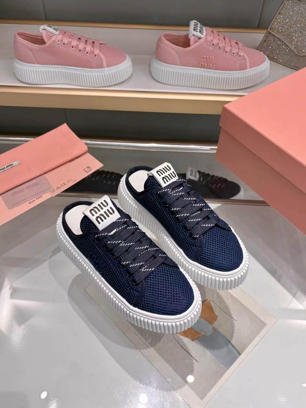 MIUMIU 26S SNEAKER MULES 45MM IN NAVY BLUE MESH