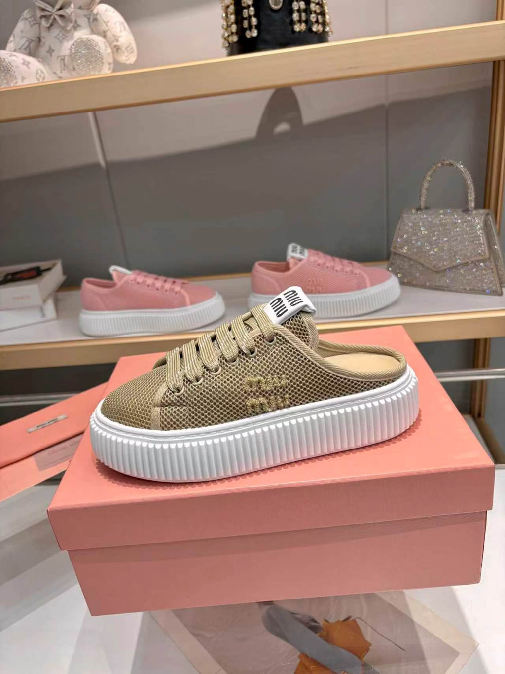 MIUMIU 26S SNEAKER MULES 45MM IN OLIVE GREEN MESH