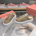 MIUMIU 26S SNEAKER MULES 45MM IN OLIVE GREEN MESH