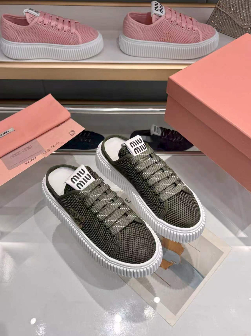MIUMIU 26S SNEAKER MULES 45MM IN DARK OLIVE GREEN MESH