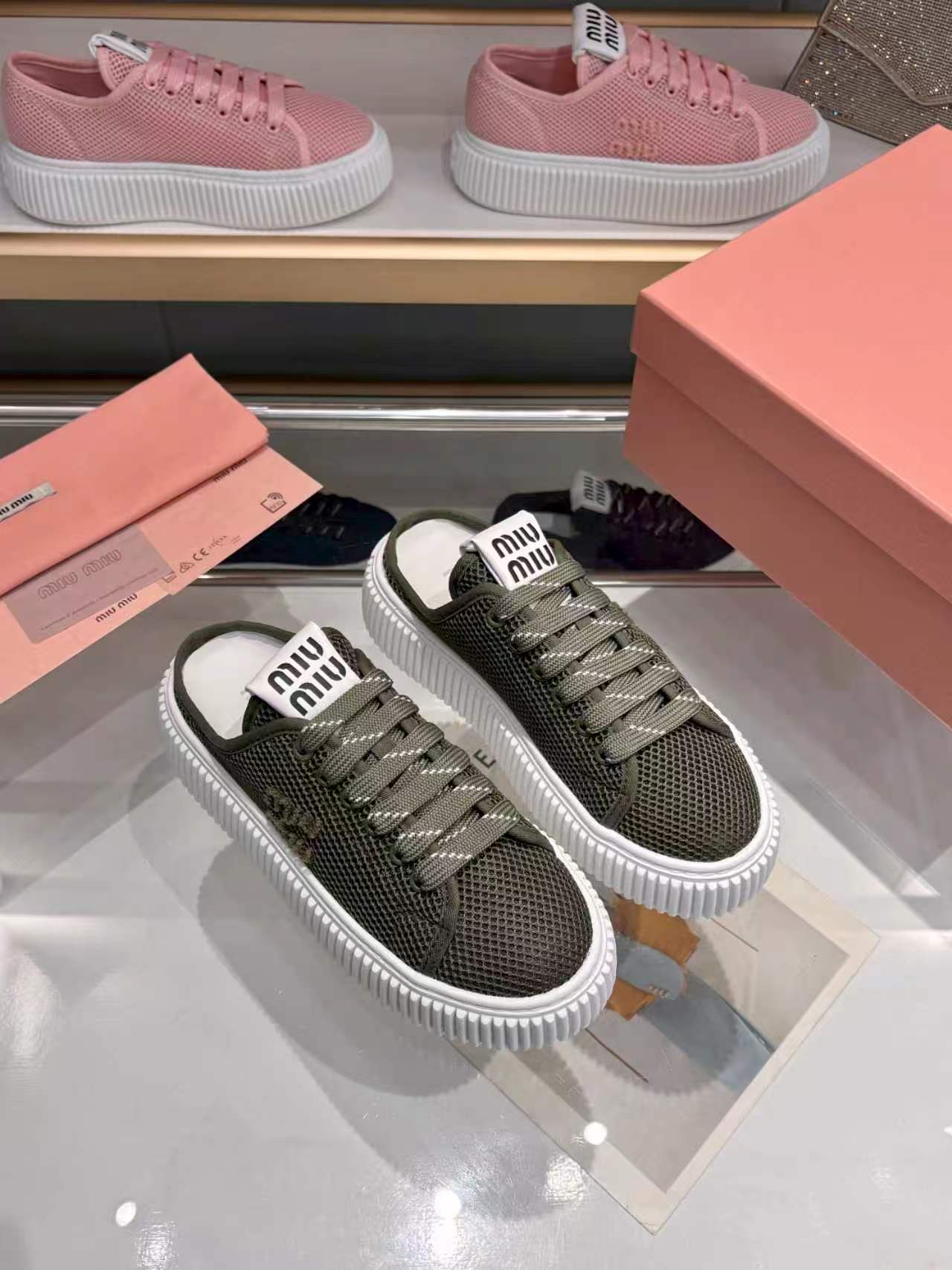 MIUMIU 26S SNEAKER MULES 45MM IN DARK OLIVE GREEN MESH