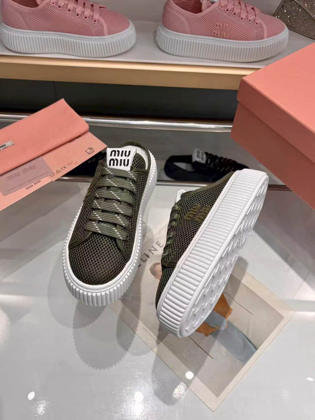 MIUMIU 26S SNEAKER MULES 45MM IN DARK OLIVE GREEN MESH