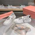 MIUMIU 26S MARY JANE BALLERINAS IN WHITE AND BLACK CALFSKIN