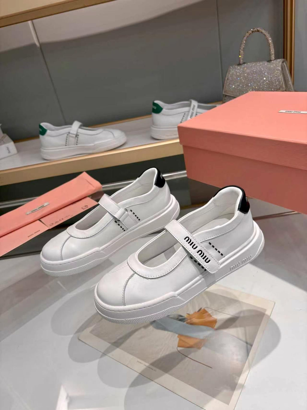 MIUMIU 26S MARY JANE BALLERINAS IN WHITE AND BLACK CALFSKIN