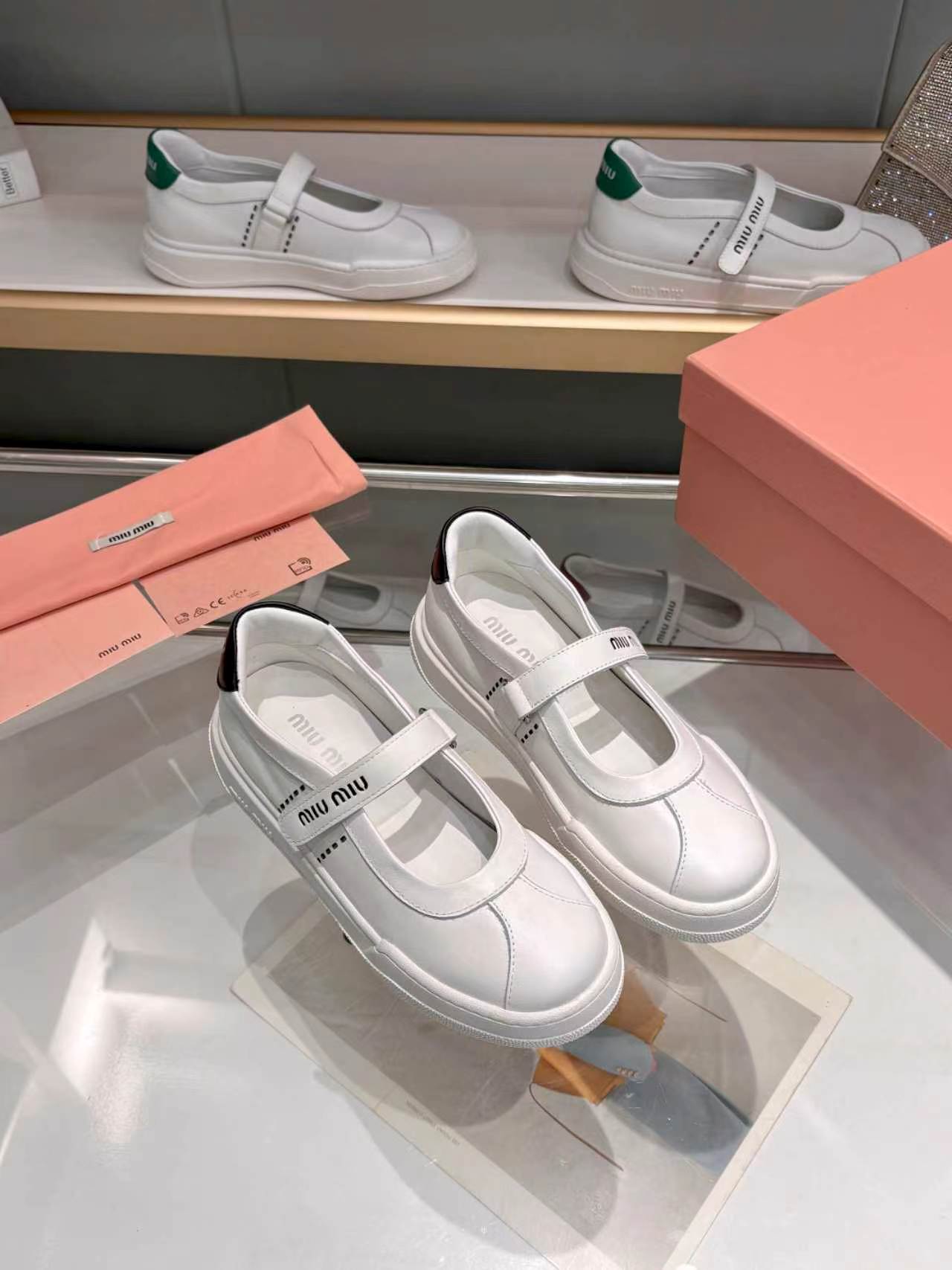 MIUMIU 26S MARY JANE BALLERINAS IN WHITE AND BLACK CALFSKIN