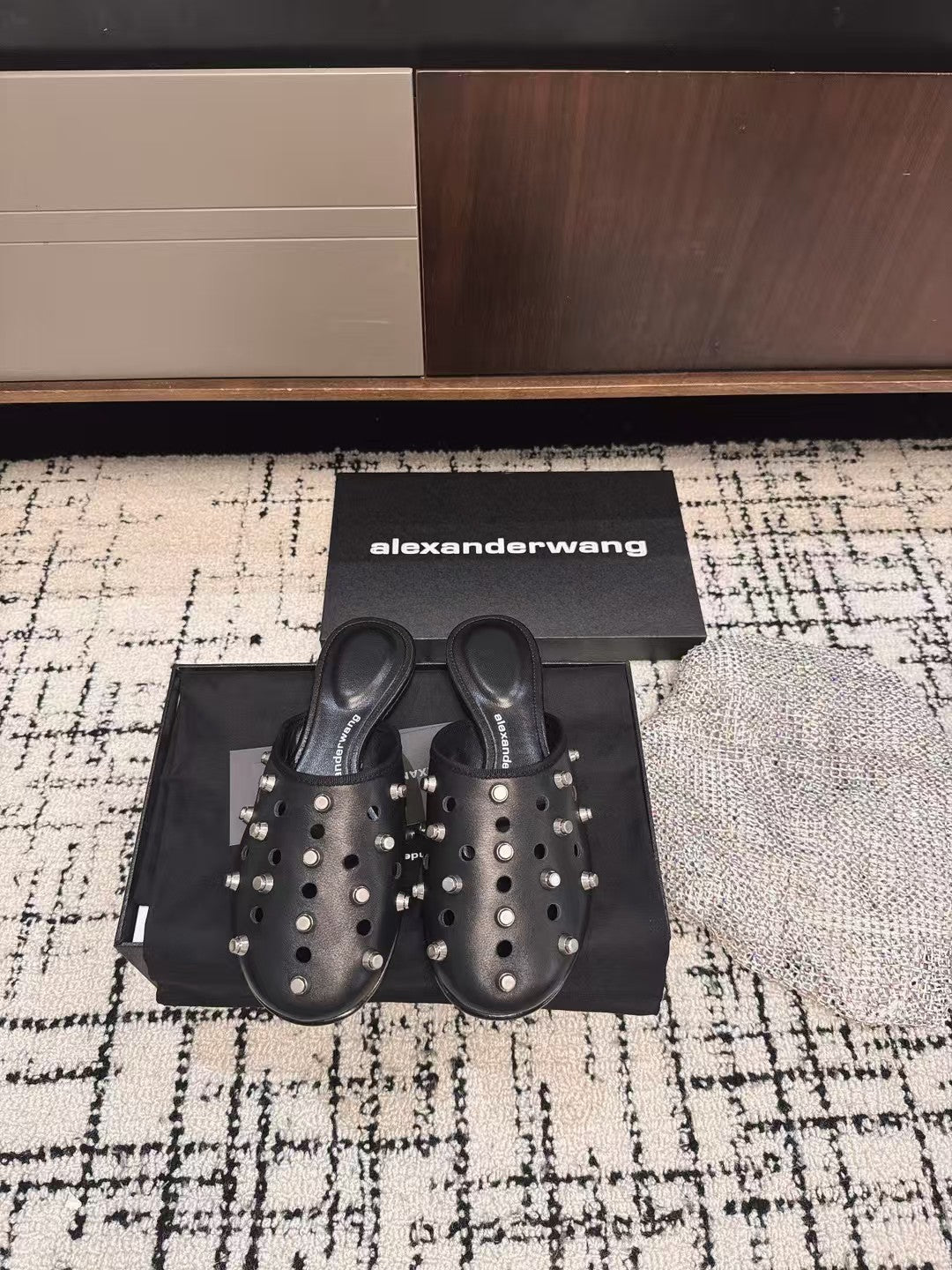 RHODES STUDDED FLAT MULE IN BLACK CALFSKIN