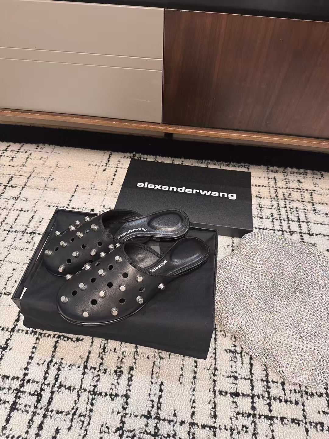 RHODES STUDDED FLAT MULE IN BLACK CALFSKIN