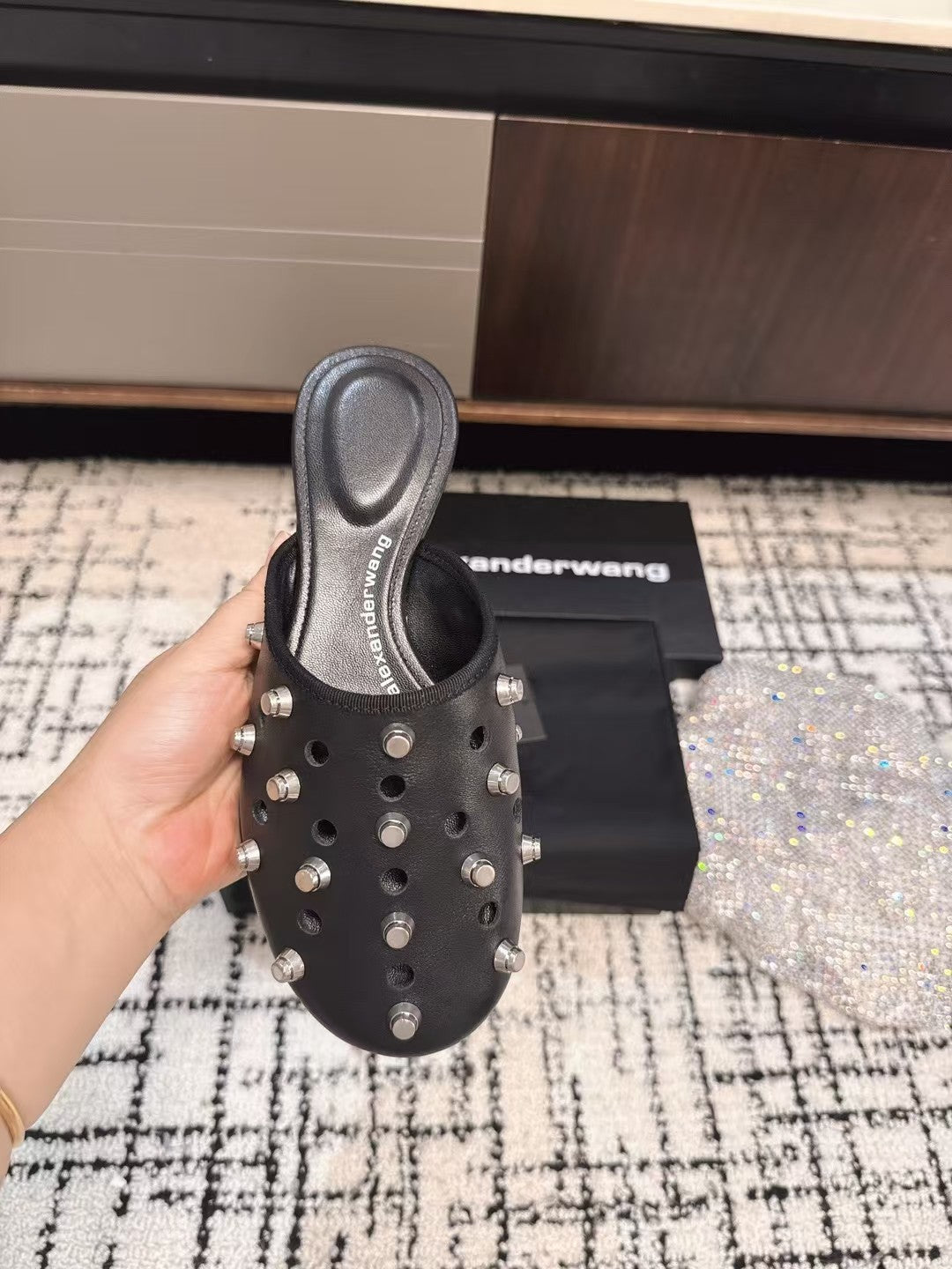 RHODES STUDDED FLAT MULE IN BLACK CALFSKIN