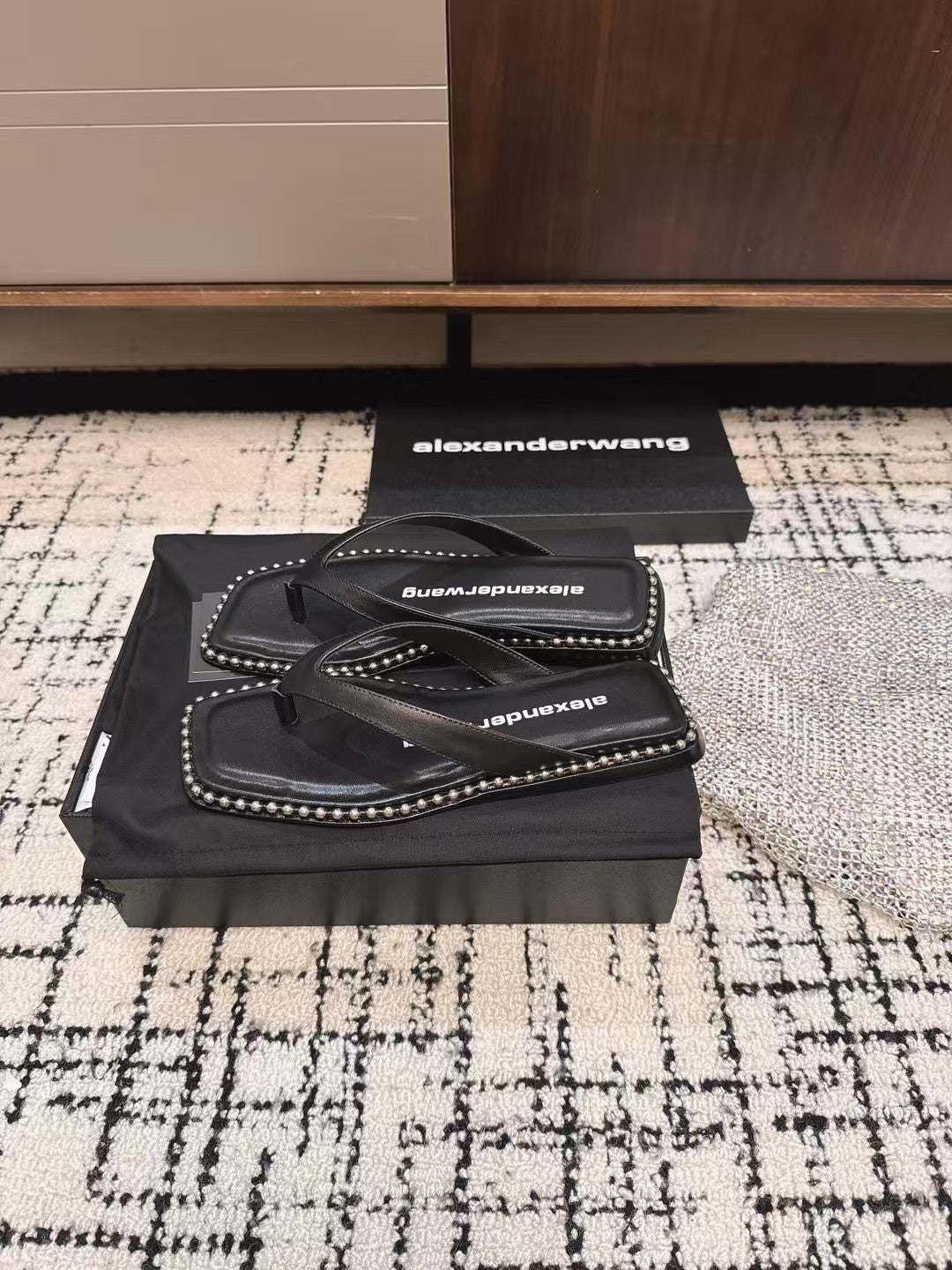 RHODES STUDDED THONG SANDAL IN BLACK CALFSKIN
