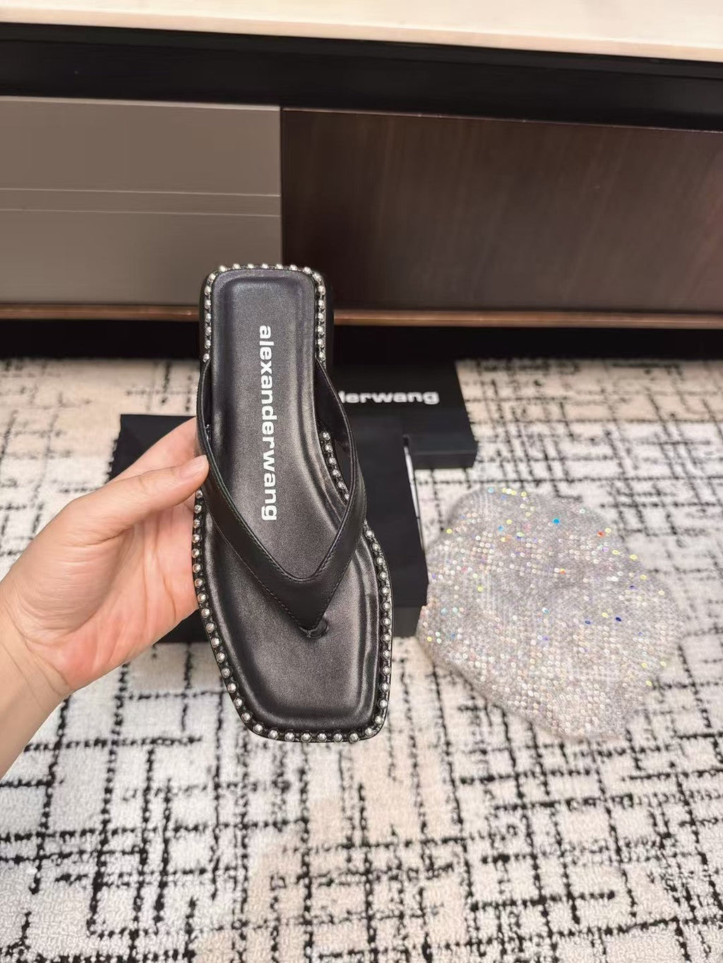 RHODES STUDDED THONG SANDAL IN BLACK CALFSKIN
