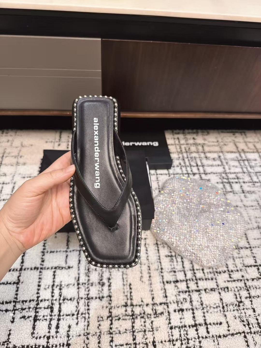 RHODES STUDDED THONG SANDAL IN BLACK CALFSKIN