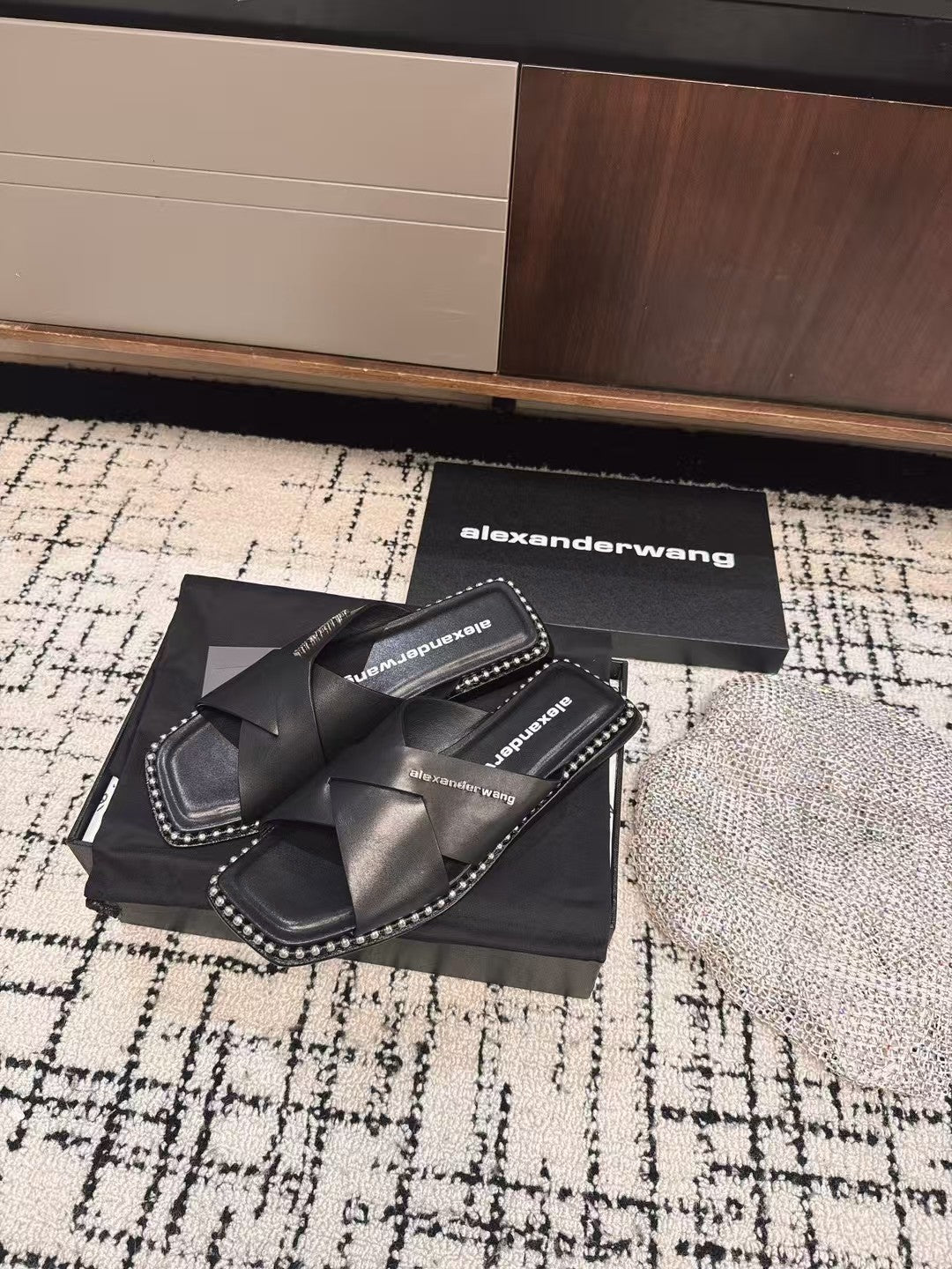 RHODES STUDDED SLIDE SANDAL IN BLACK CALFSKIN