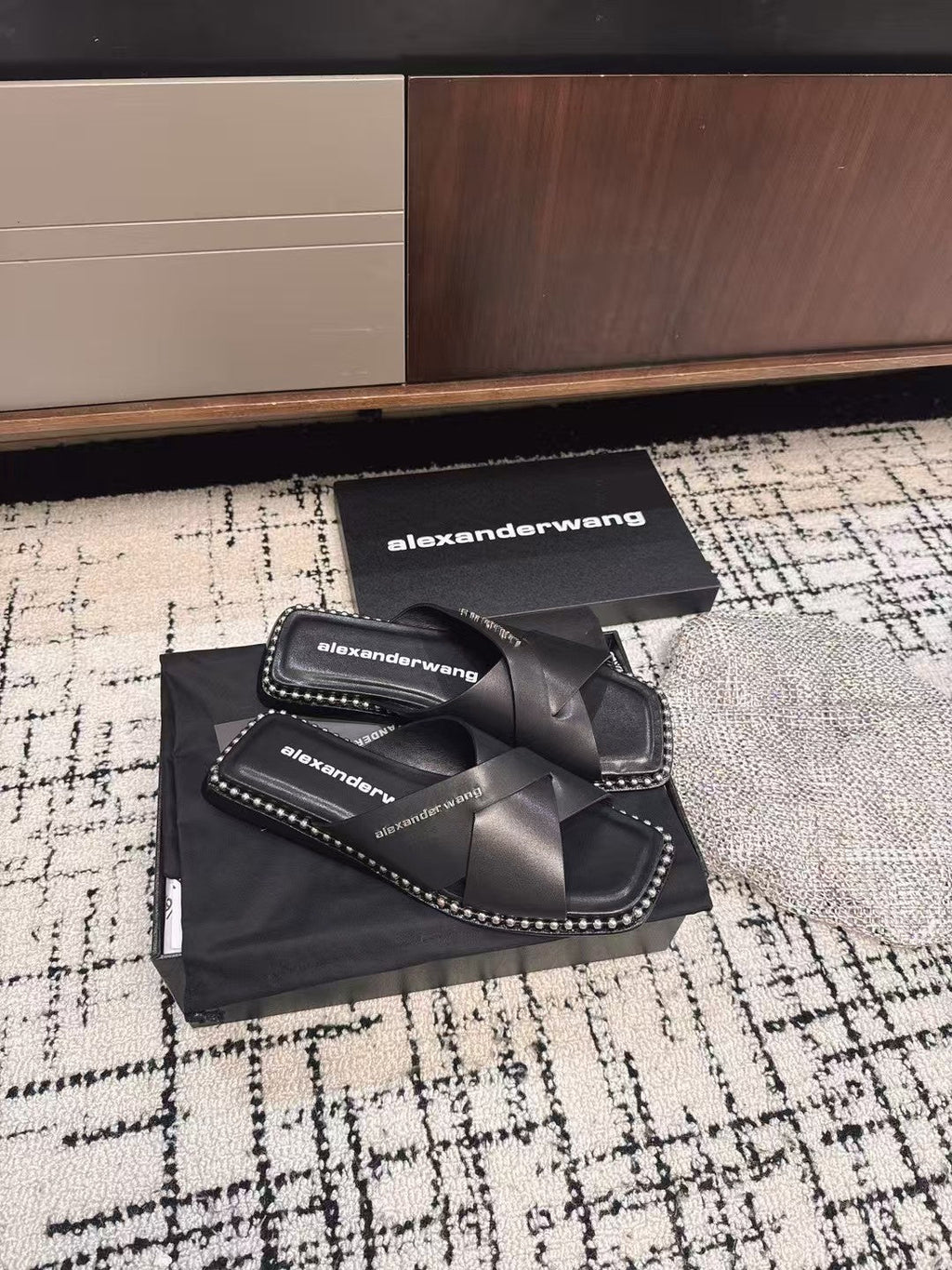 RHODES STUDDED SLIDE SANDAL IN BLACK CALFSKIN