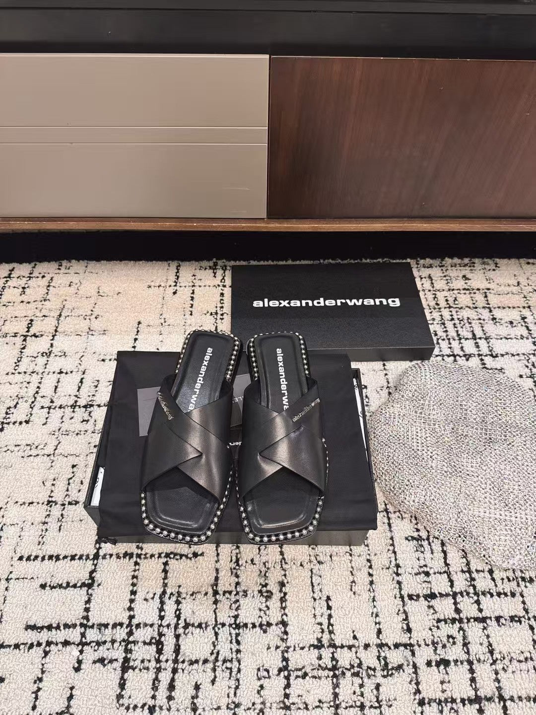 RHODES STUDDED SLIDE SANDAL IN BLACK CALFSKIN