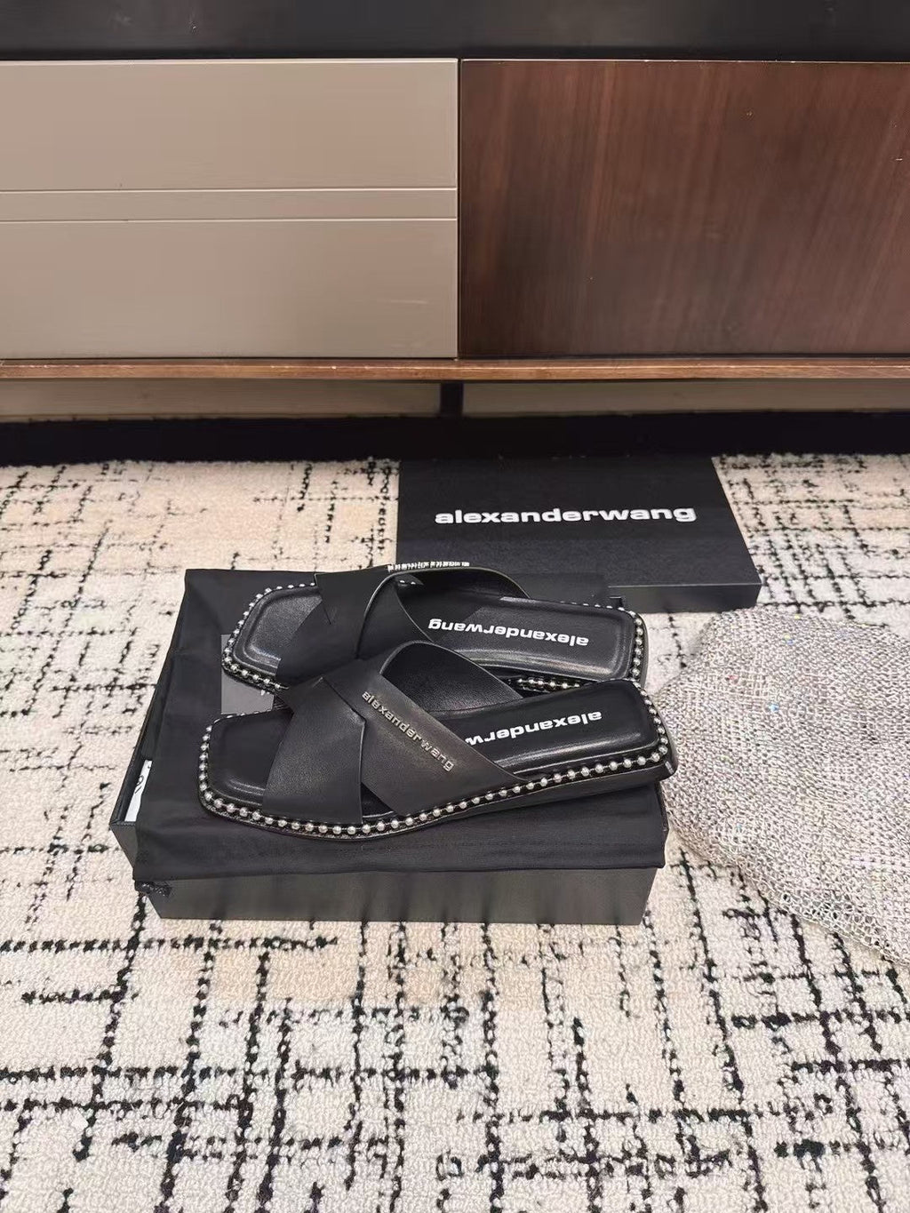 RHODES STUDDED SLIDE SANDAL IN BLACK CALFSKIN