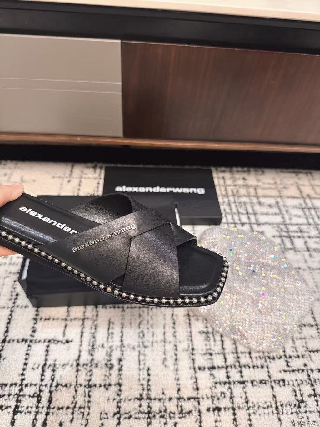 RHODES STUDDED SLIDE SANDAL IN BLACK CALFSKIN