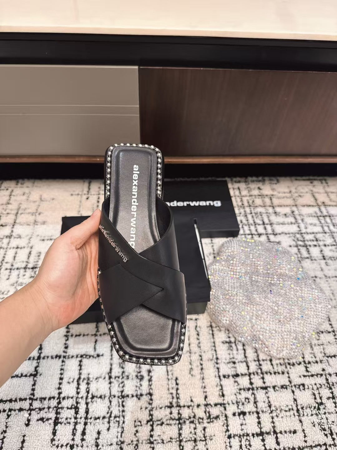 RHODES STUDDED SLIDE SANDAL IN BLACK CALFSKIN